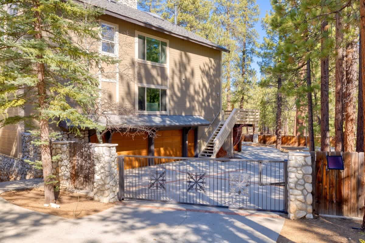 Long gated driveway parking for 6 cars.