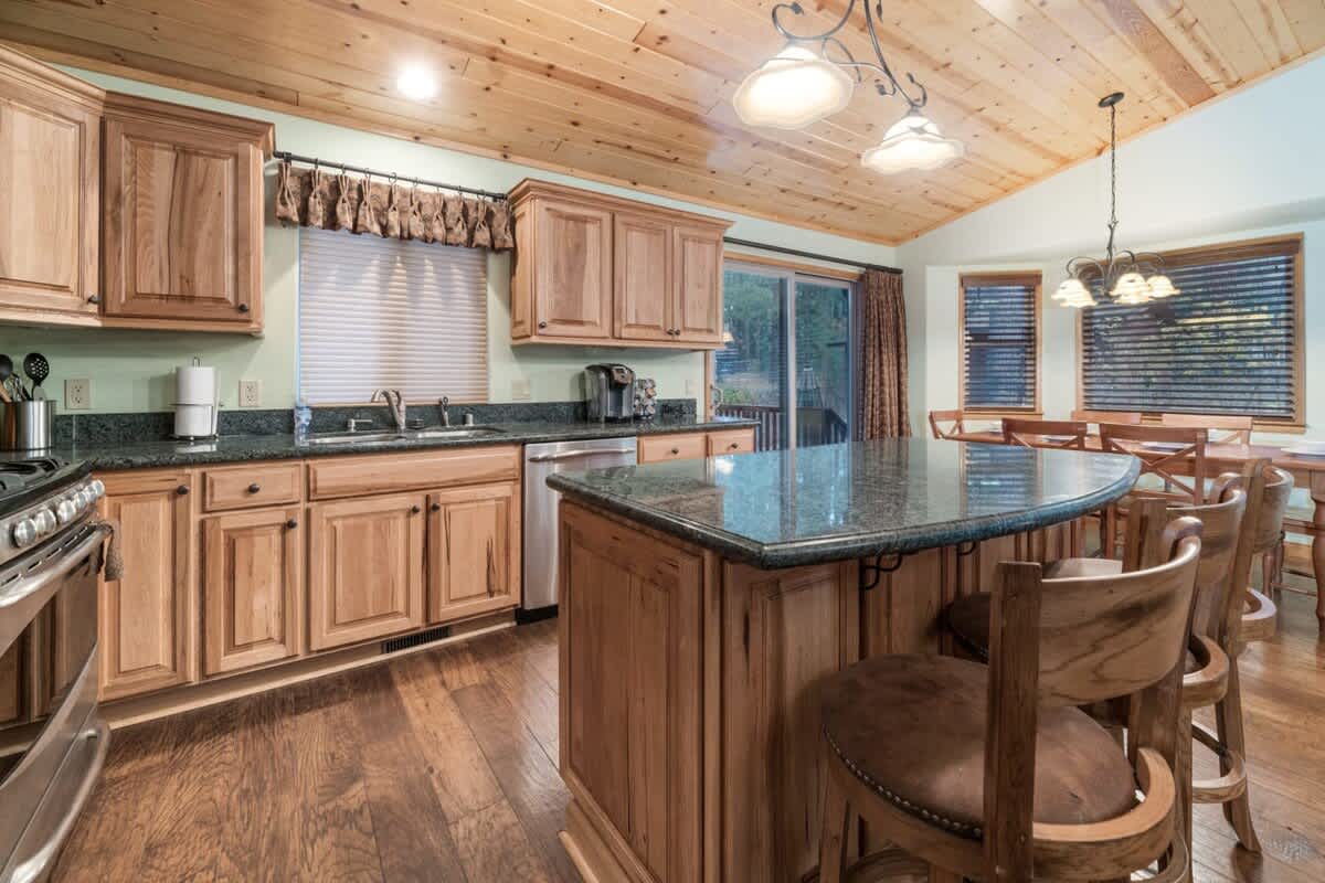 Kitchen with granite breakfast bar