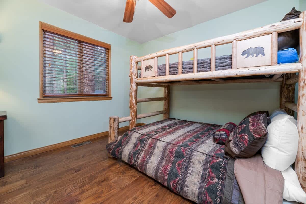 Third bedroom with full-over-queen log bunk
