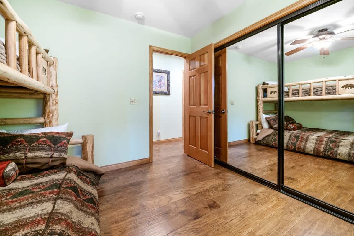 Third bedroom with mirrored closet