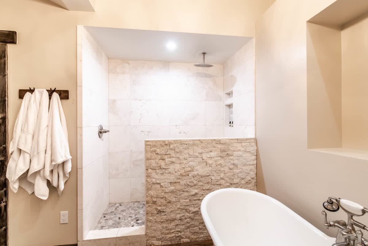 Clawfoot soaking tub and walk-in shower