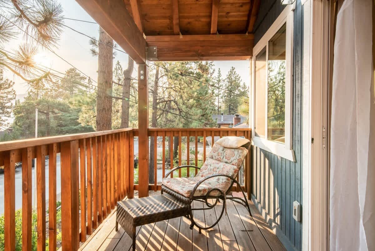 Balcony lounge chair among the pines