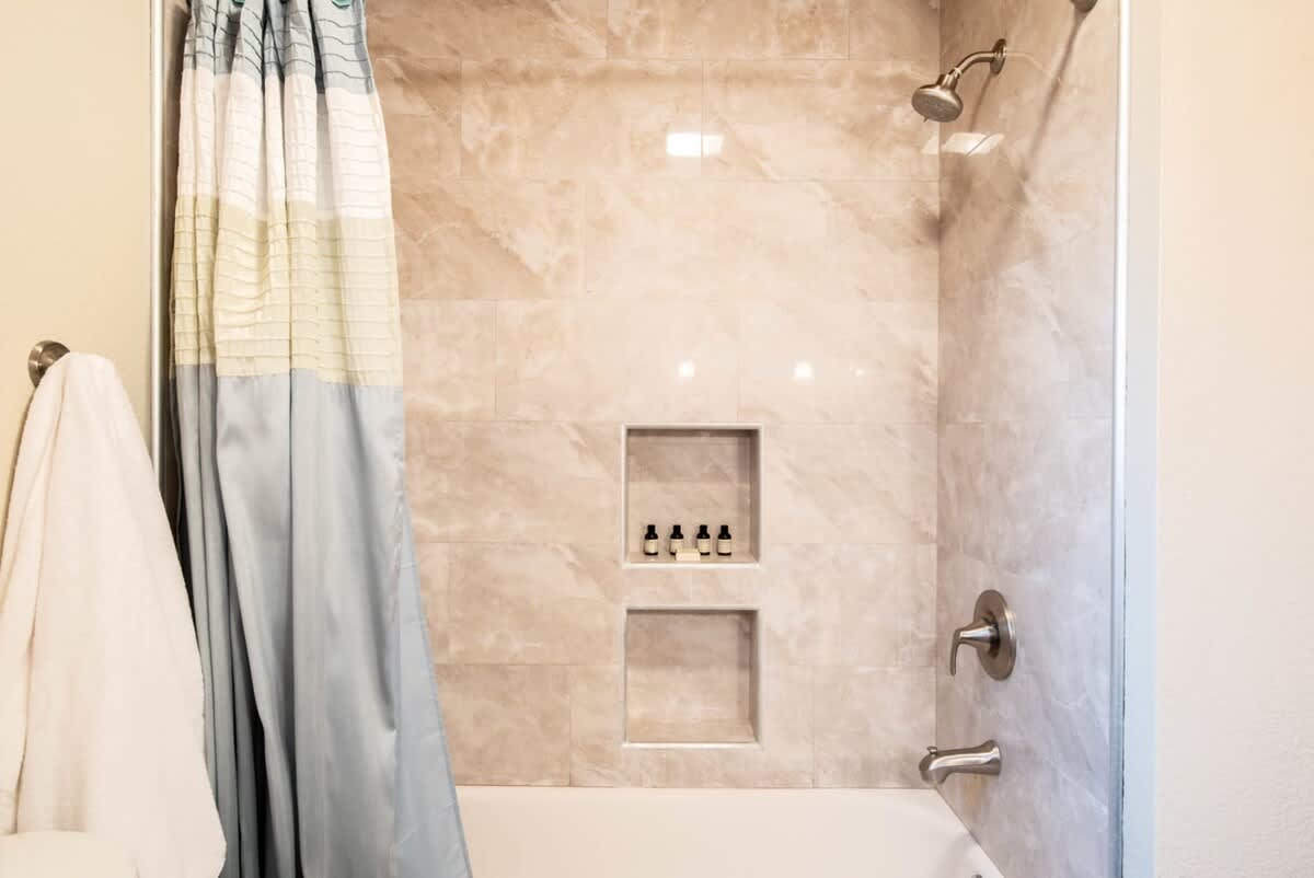 Tub and shower in the guest house