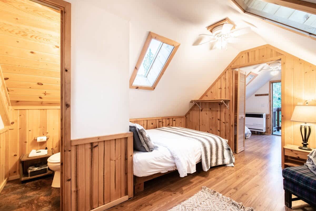 Guest house upstairs bedroom with skylights