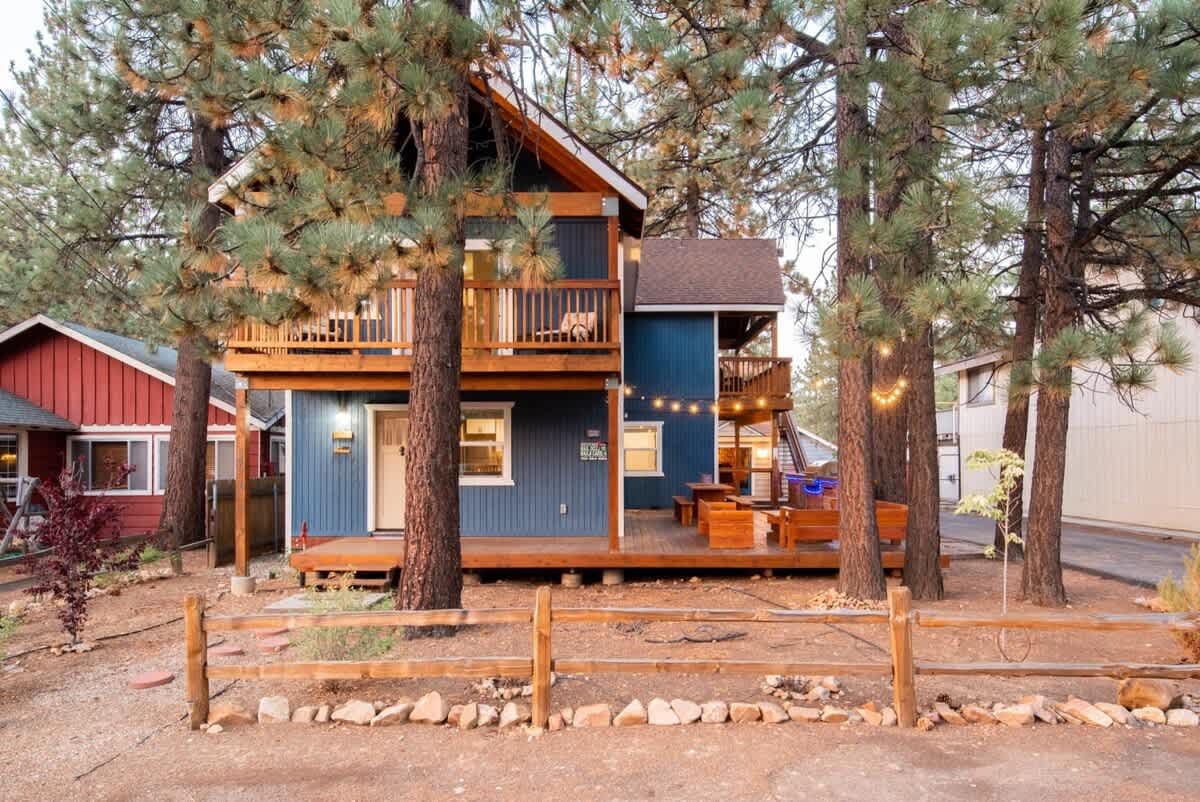 Lake View Retreat: main house with deck and string lights