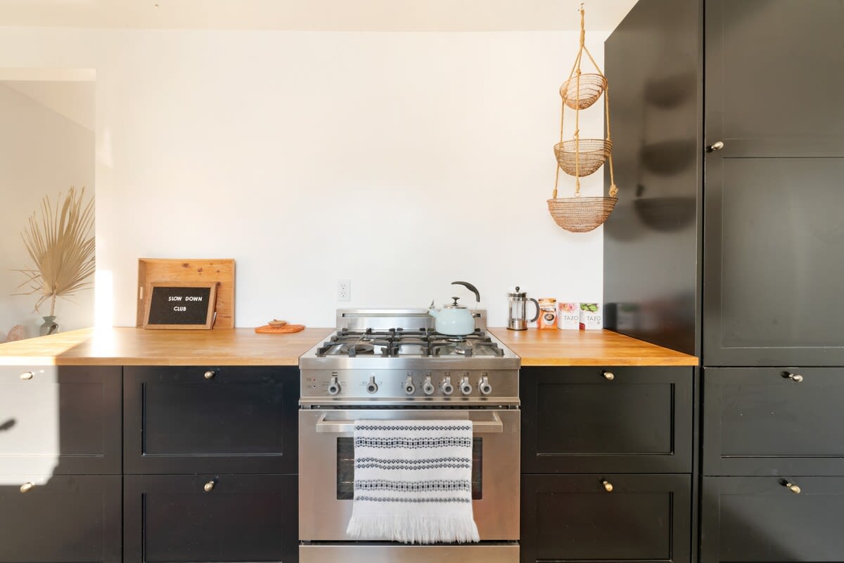 Gas range and plenty of counter space for cooking.