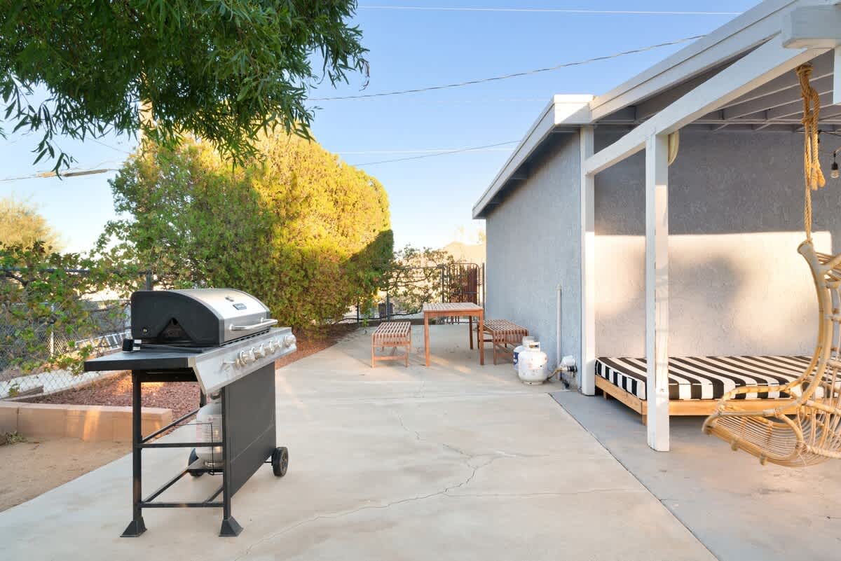 Propane BBQ and outdoor lounge space.