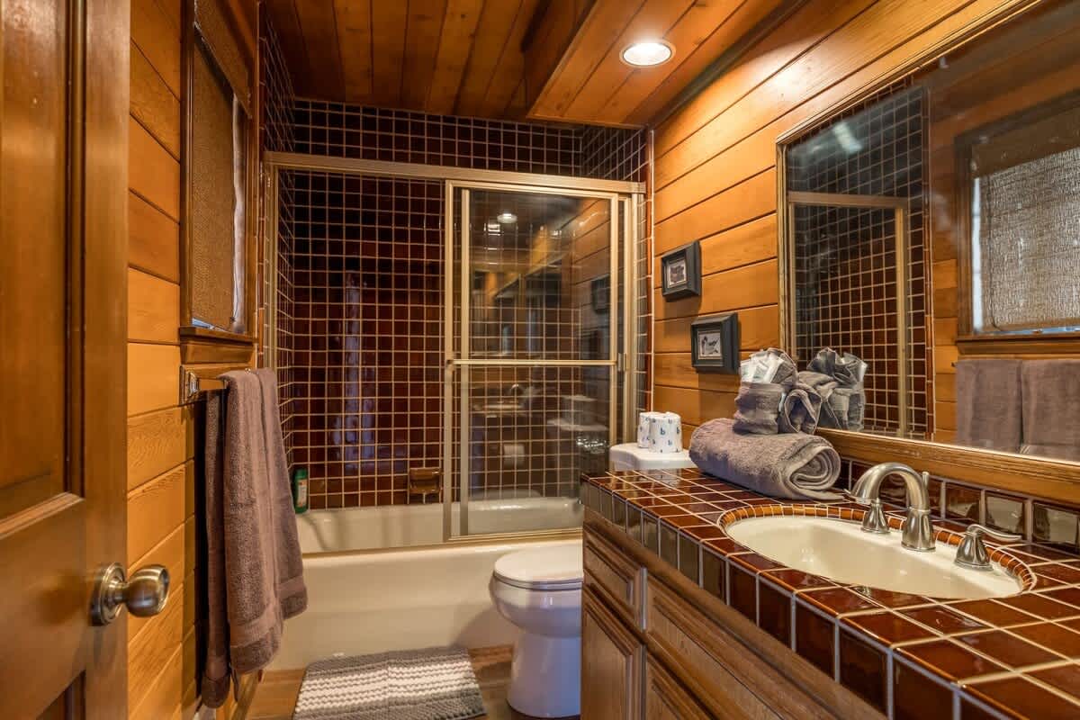 Bathroom with tub and shower