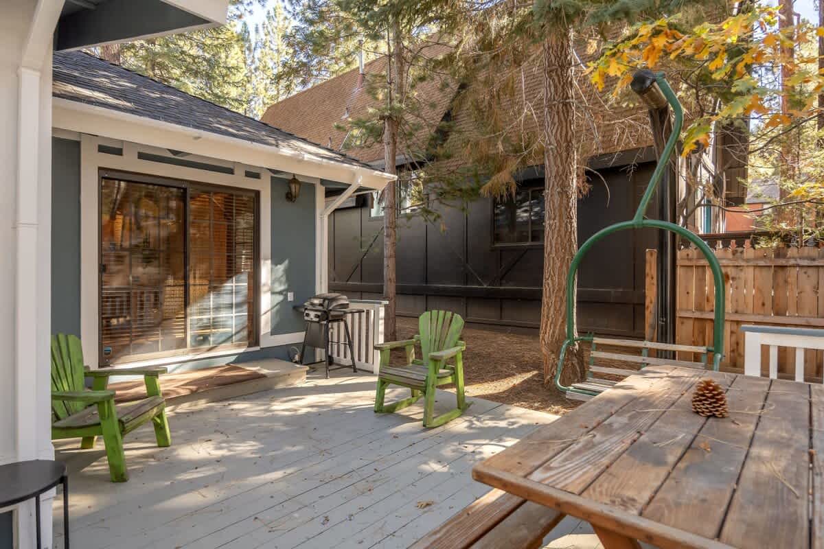 Back deck with BBQ, picnic table and ski-lift swing