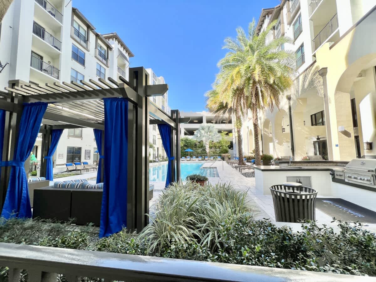 Lush Courtyard Views Luxury Amenities in Westshore