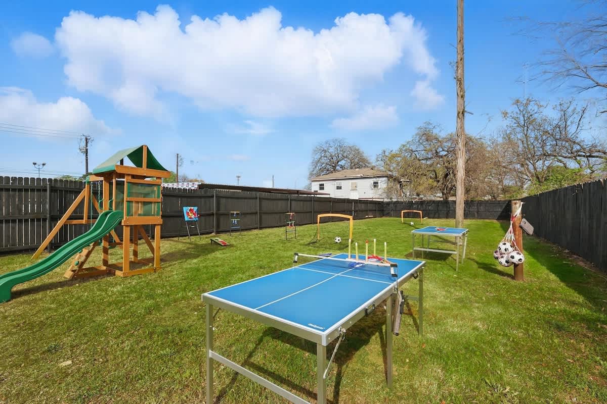 “Games Galore in the Backyard” From ping pong and mini soccer to cornhole and a full playset, the shared backyard is packed with activities to keep both kids and adults entertained.