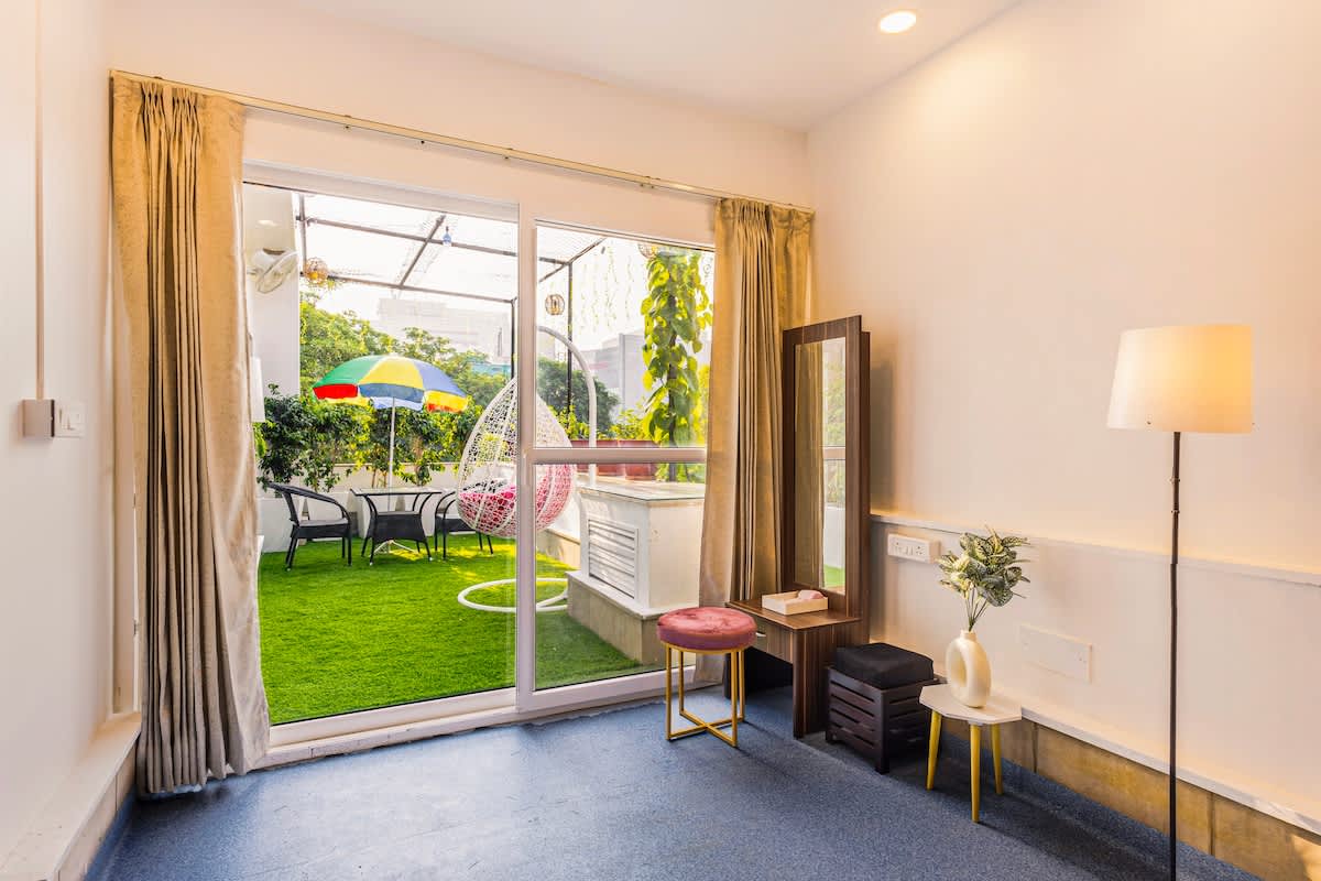 Large dressing area with bespoke cabinetry, full-length mirrors, and excellent lighting. Offers comfortable seats, abundant hanging space, and tidy shoe and accessory shelves. Perfect design and function for luxury dressing.