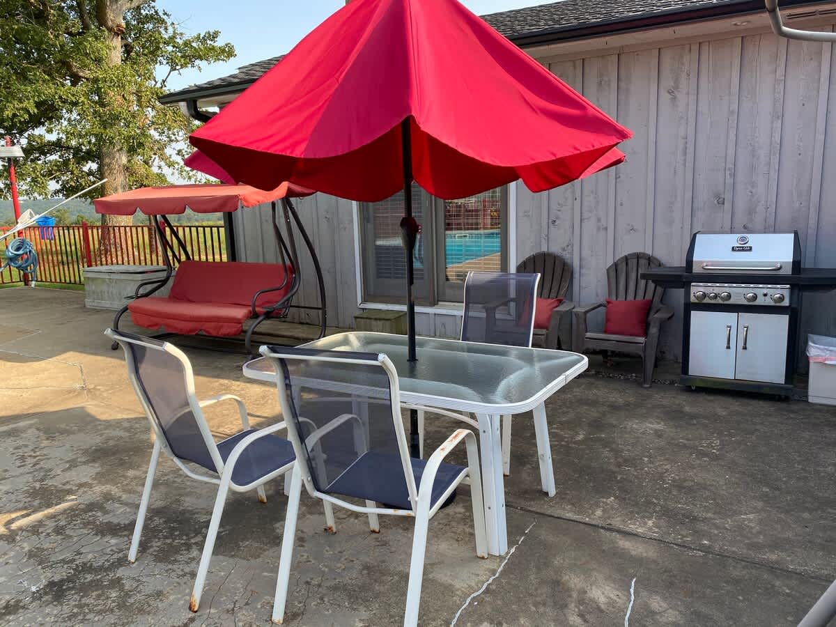 Patio includes: Large Saltwater Pool with Diving Board, Umbrellas, Tables & Chairs , Porch Swings,  Grill & Fire Pitt
Humming Birds are frequent visitors!


