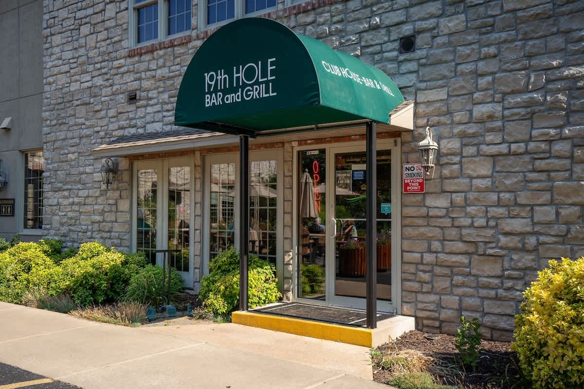 19th Hole Bar & Grill restaurant located at Pointe Royale Resort.