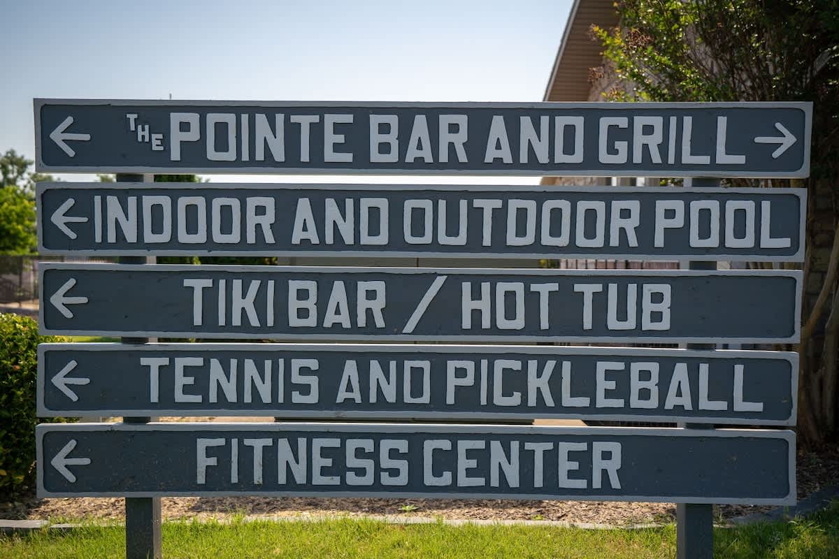 Resort sign with central activities located 1/4 from the condo.