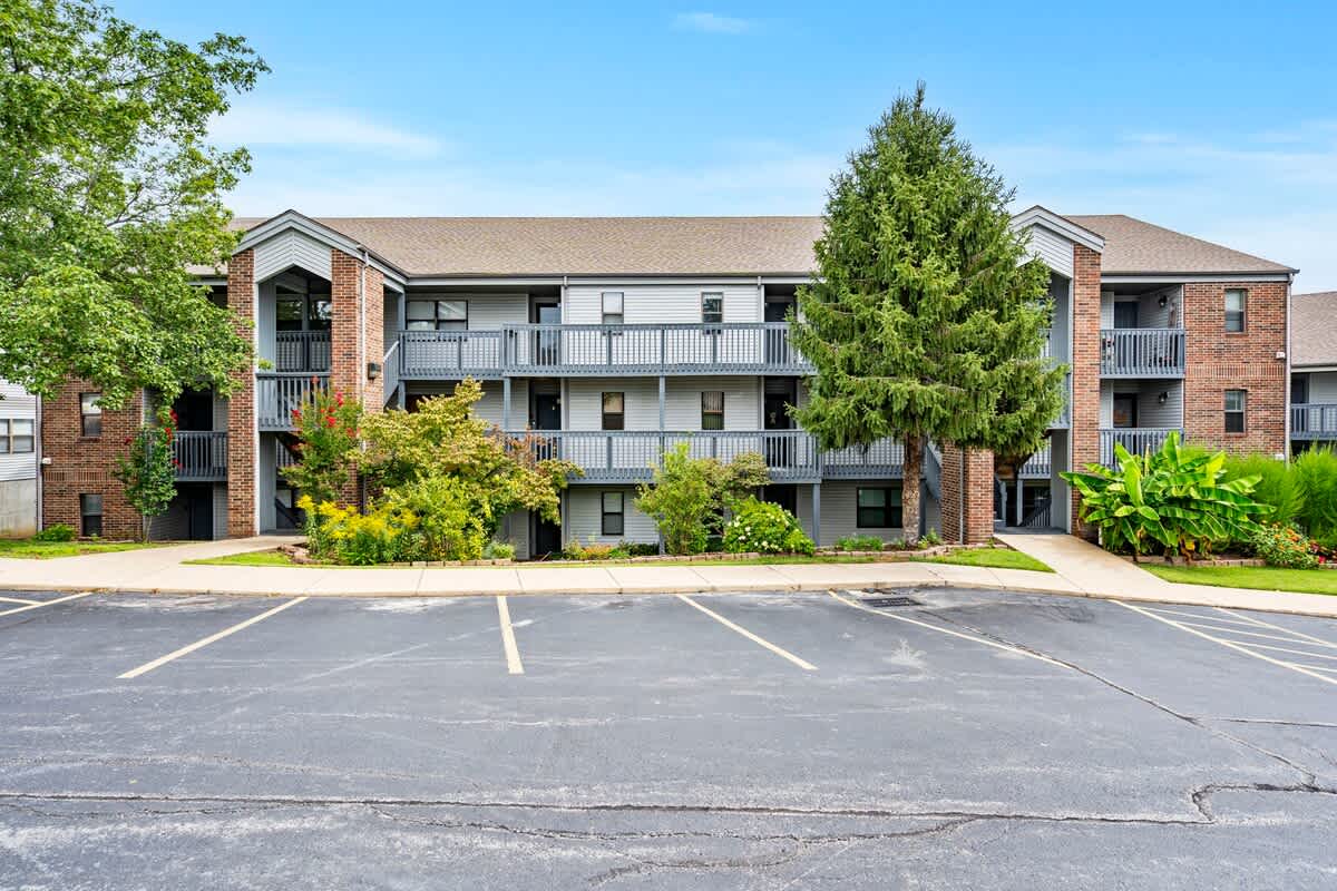 Outdoor view of condo with parking