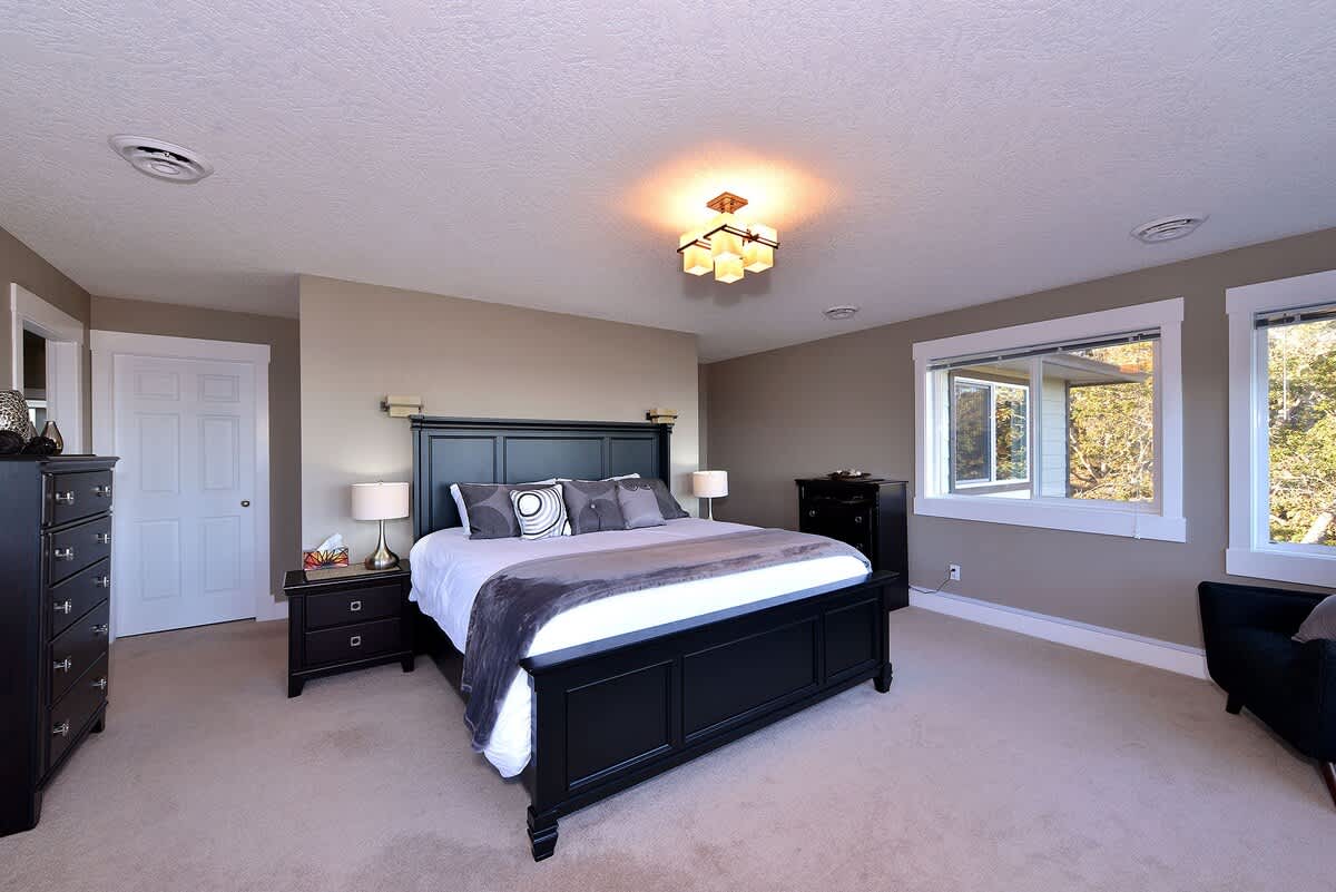 Massive master bedroom with king size bed. 