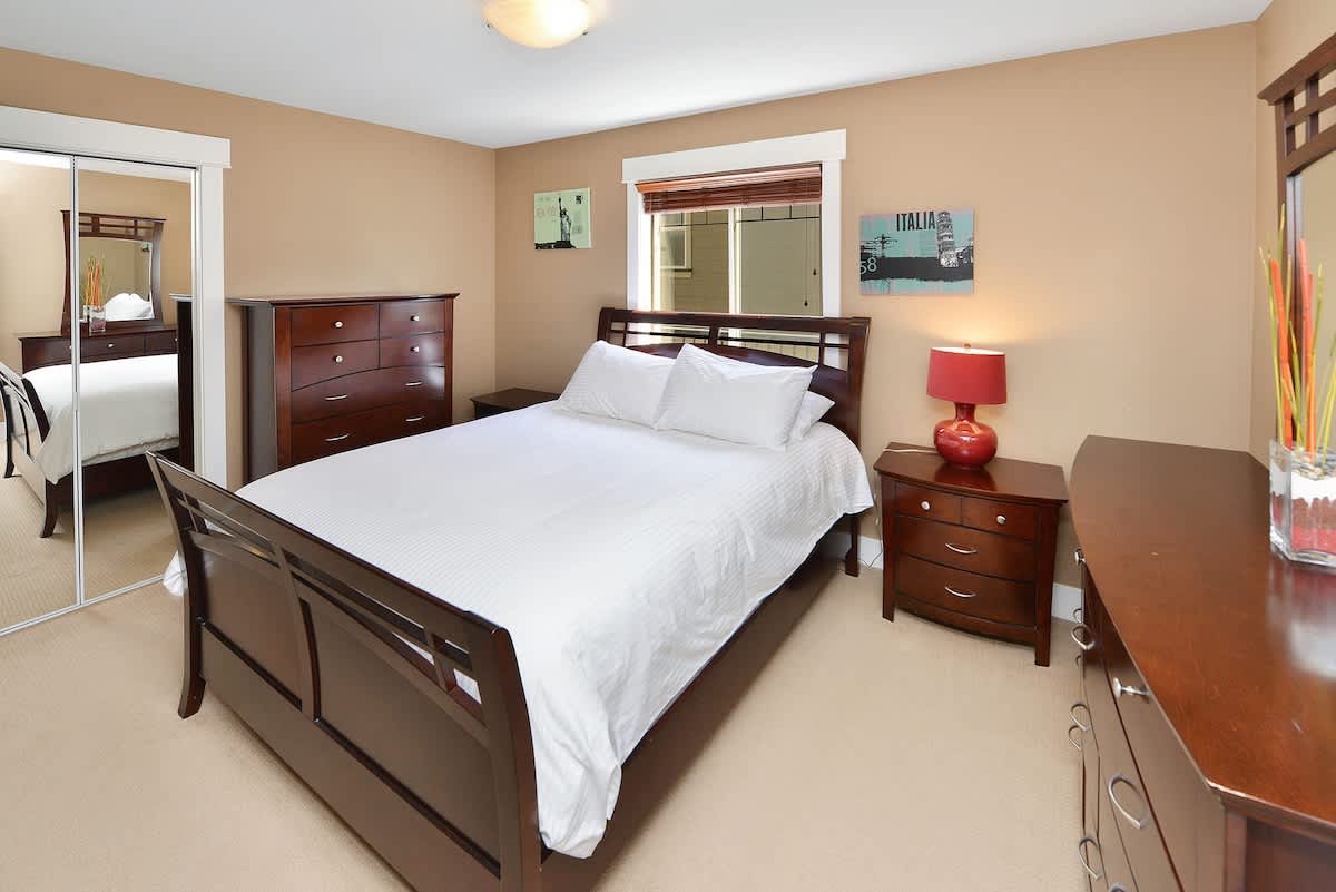 Main level 4th bedroom with Queen Bed. 