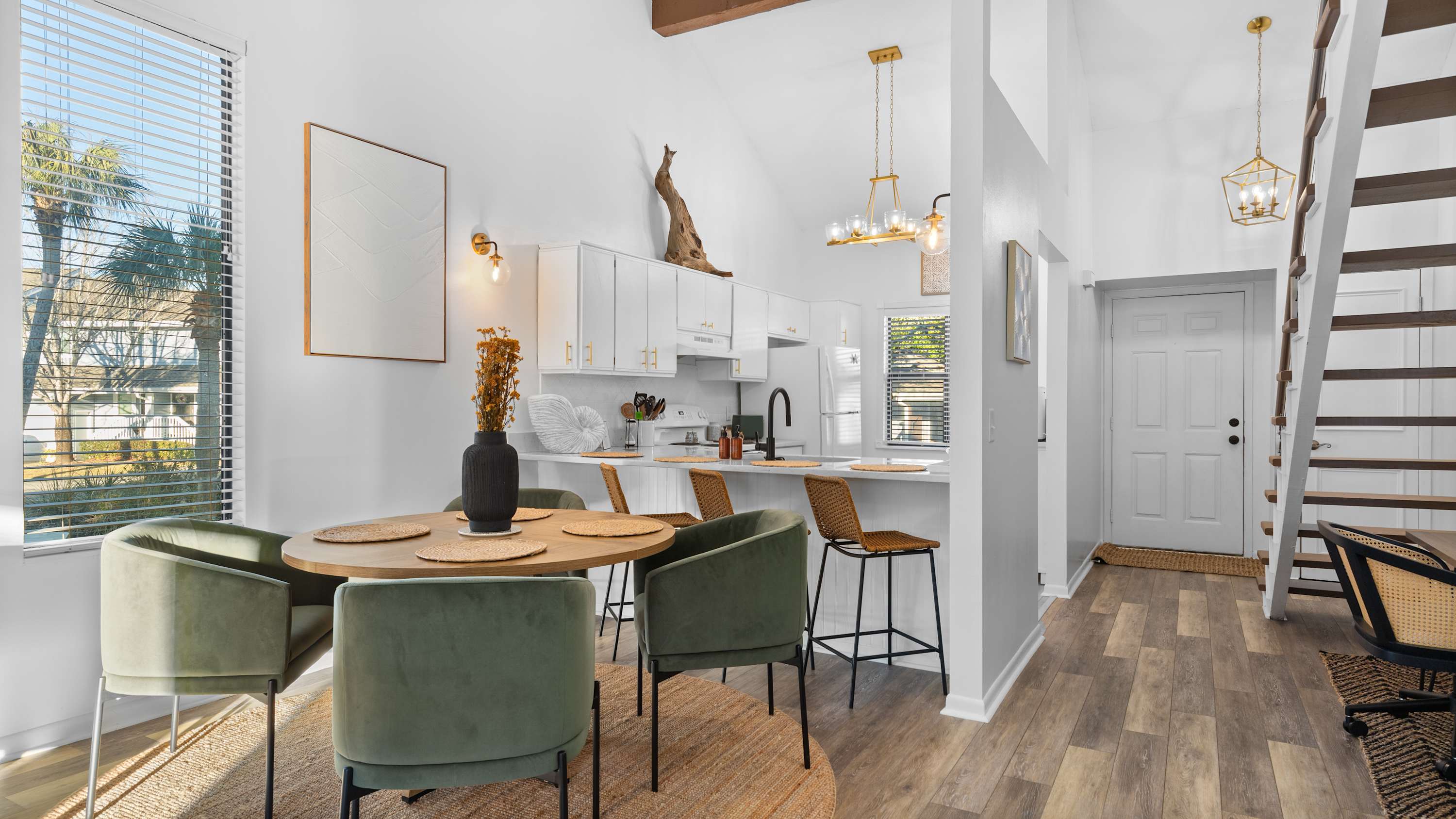 This home has two levels. The ground level has one bedroom and one full bathroom, and the upstairs has two bedrooms and one more full bathroom. 