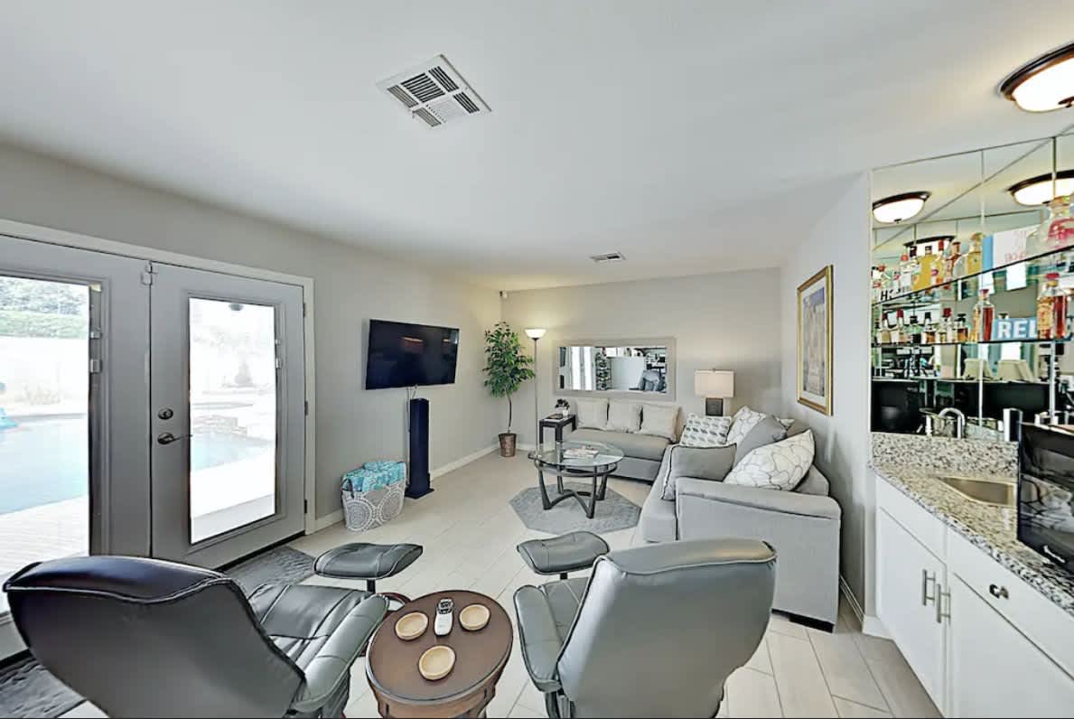 Spacious living area #2 with TV open to the kitchen