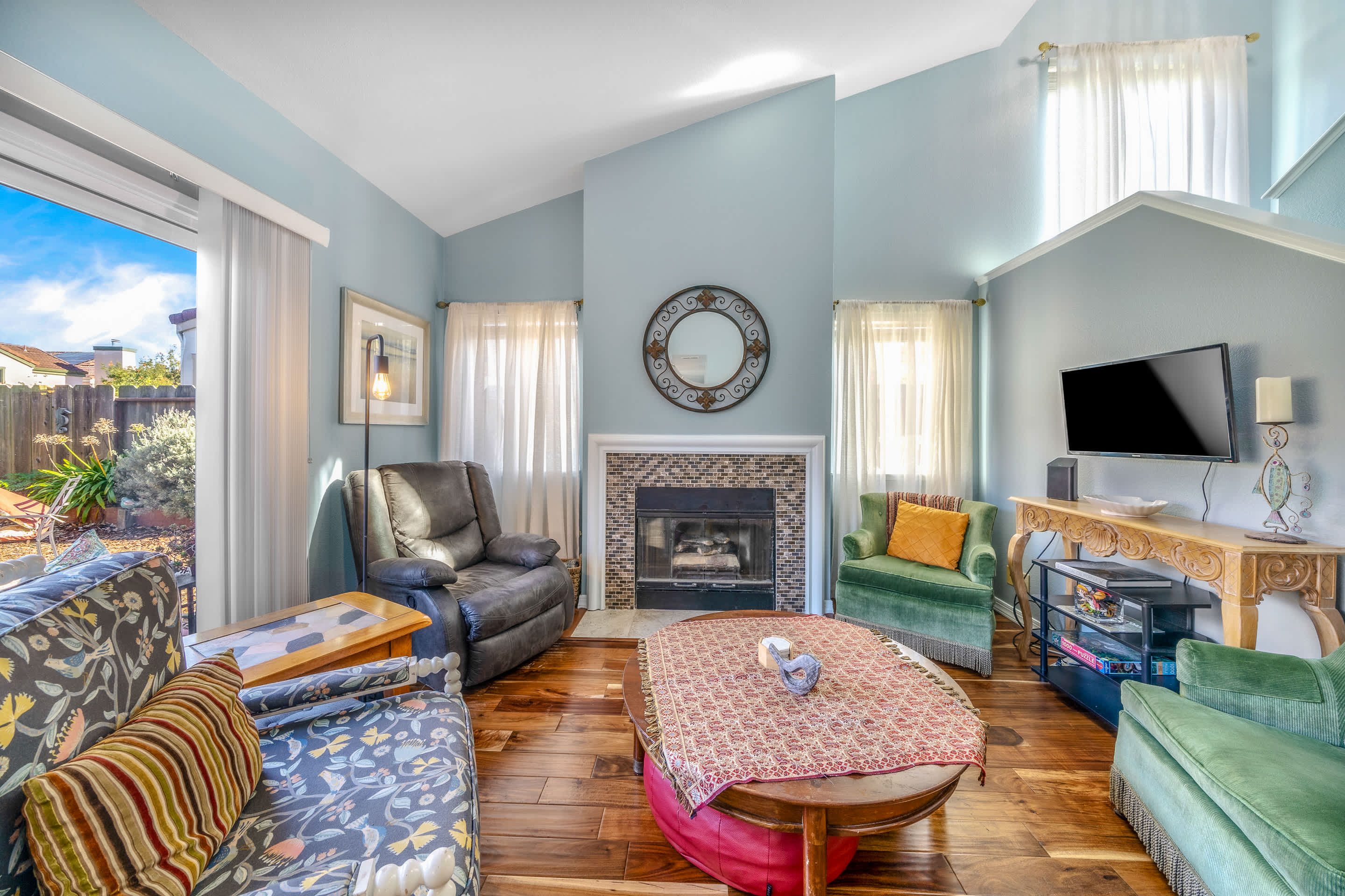 Inviting living space with abundant seating and a Smart TV