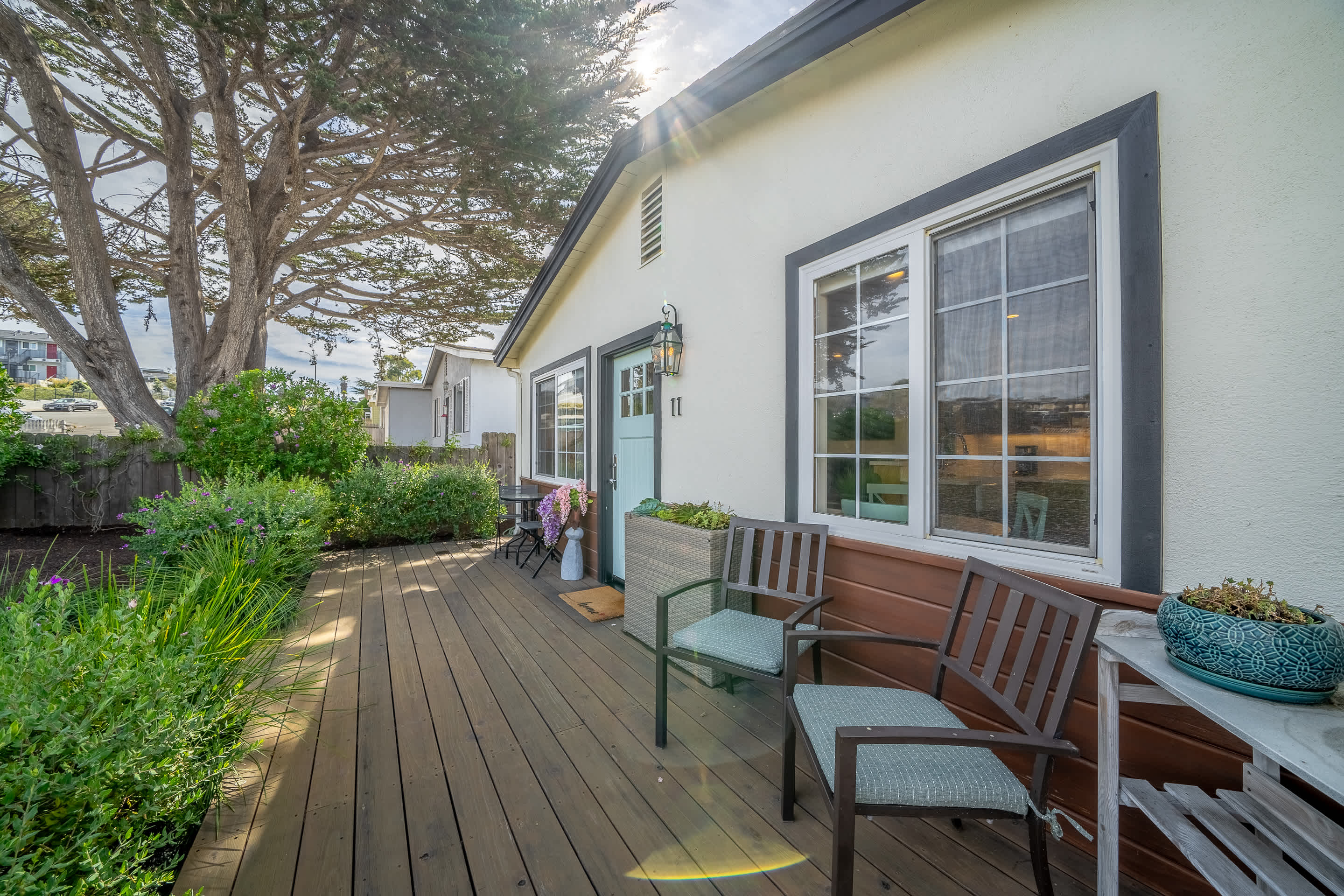 Kick back & relax in the fresh air on the sunny front porch