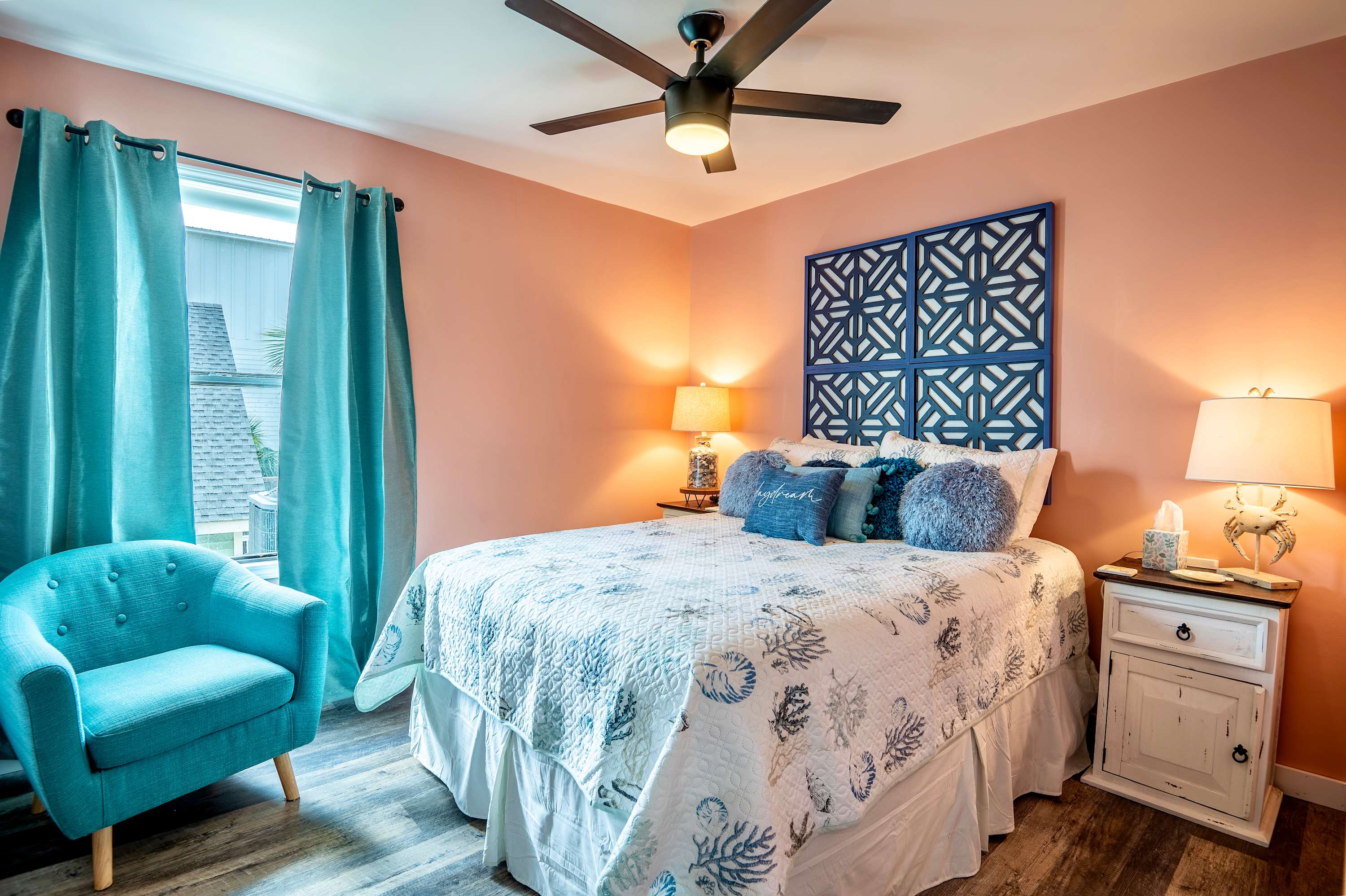 Relax in the serene second bedroom, complete with queen bed & Smart TV