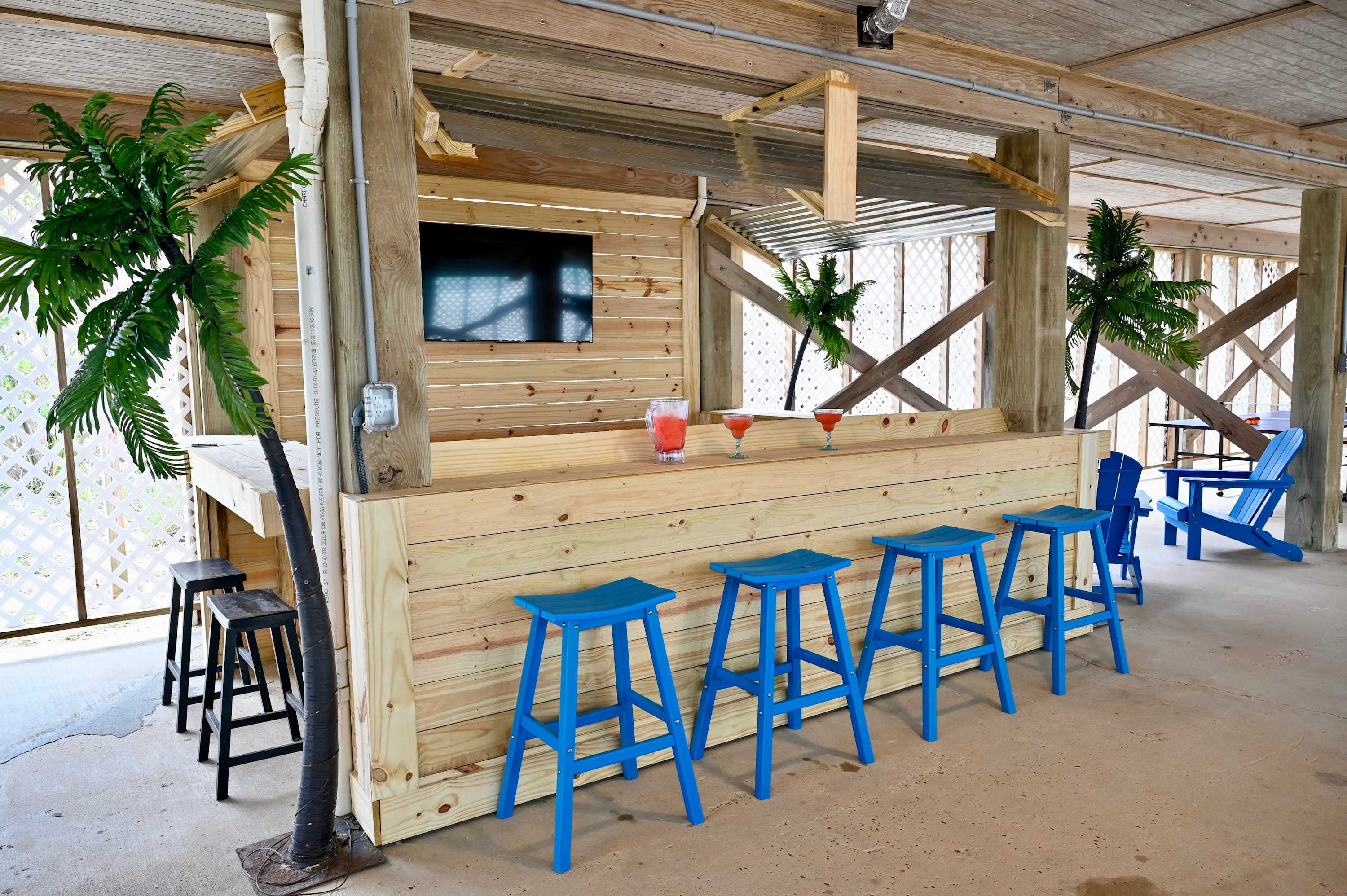 Enjoy the newly added tiki bar with ice machine and mini fridge