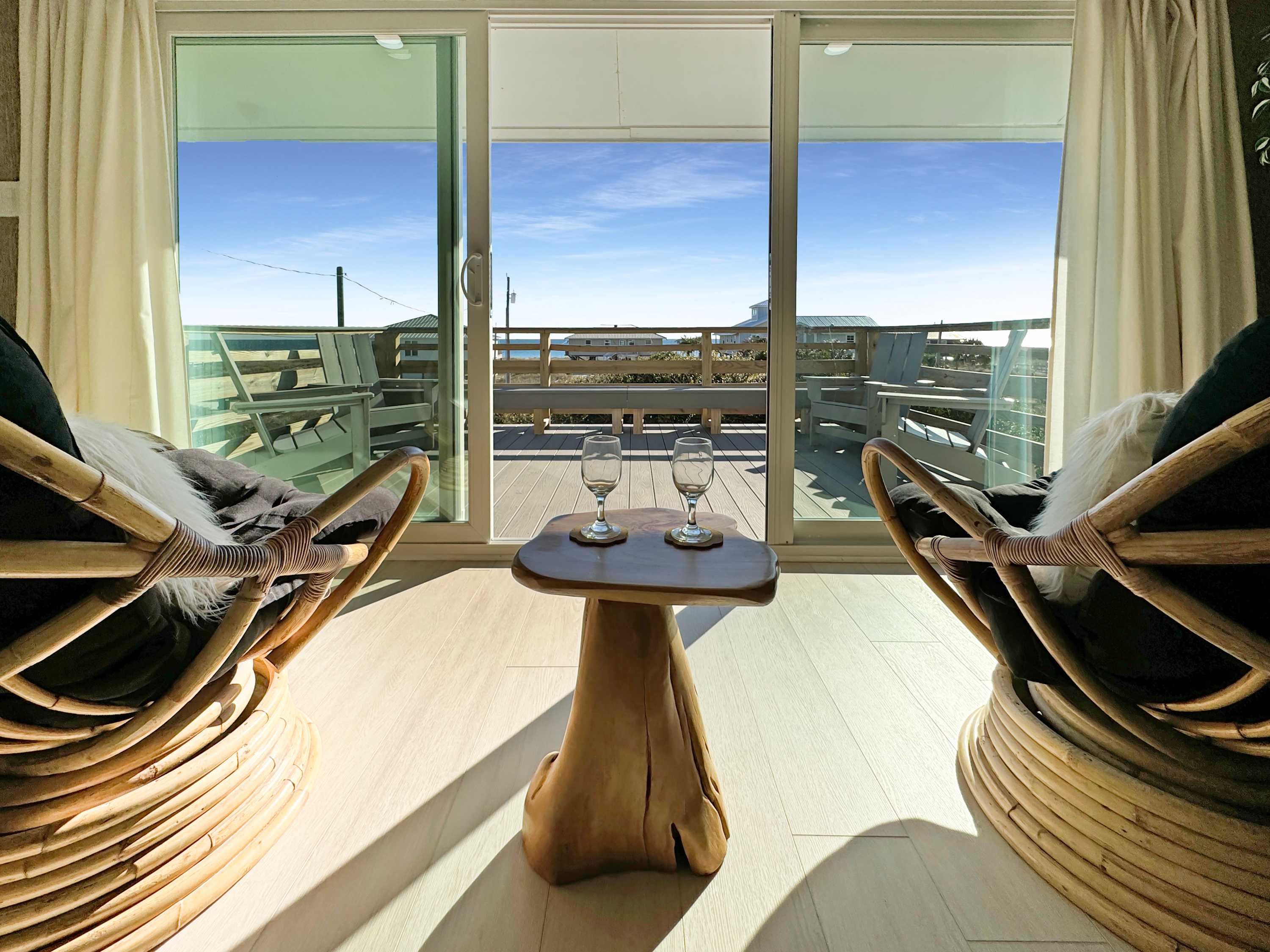 Bright living area with sofa sleeper, and Smart TV