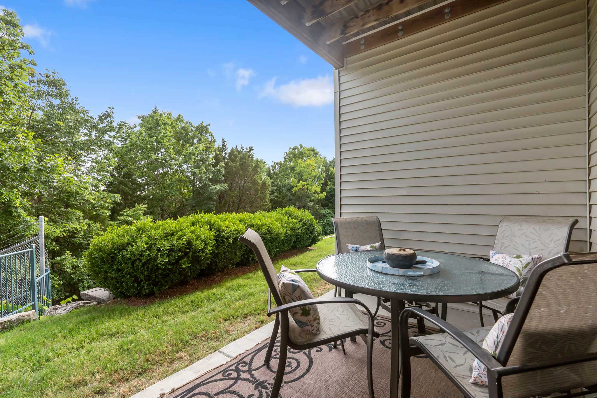 Outdoor seating in the balcony with views of the garden