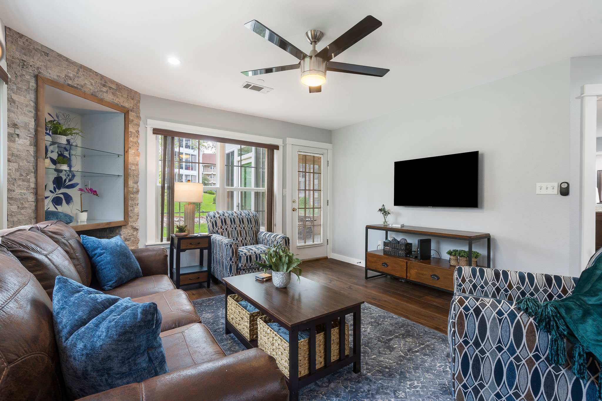 Unit #1 Cozy and spacious living area with TV and fireplace