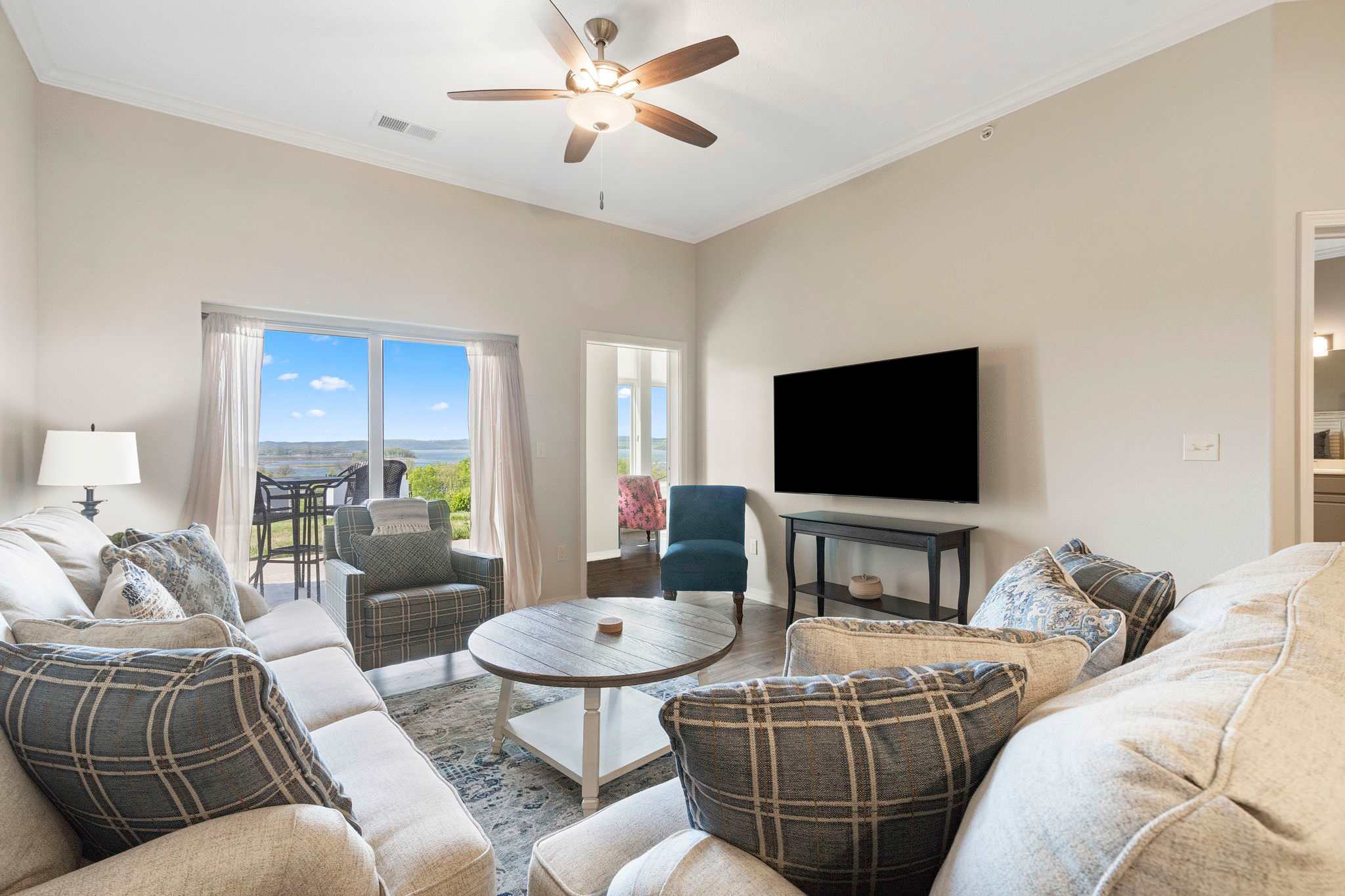 Cozy and spacious living area with TV