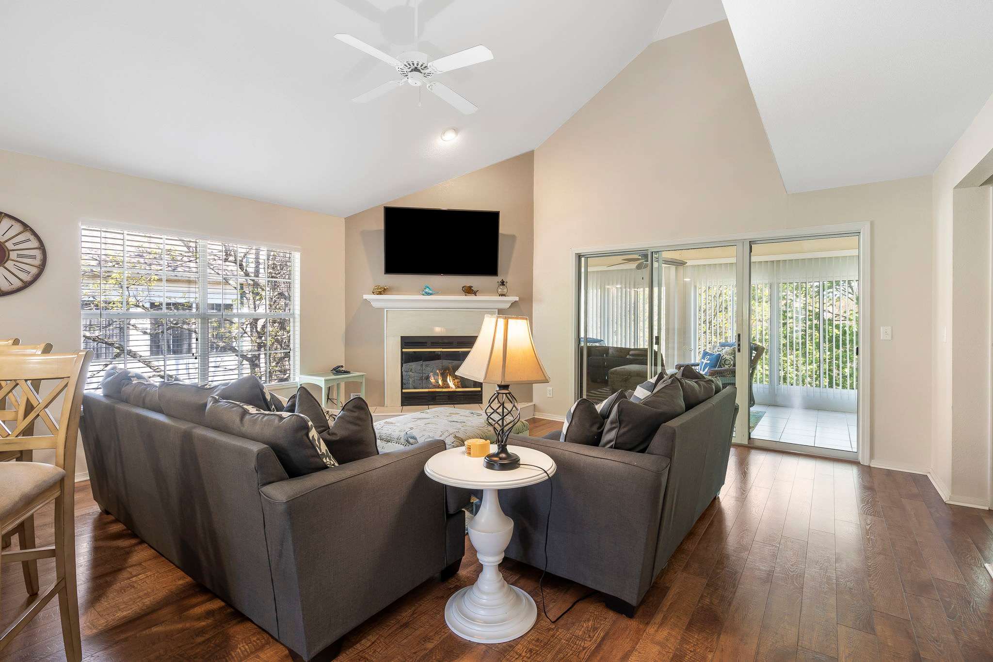 Cozy and spacious living area with TV