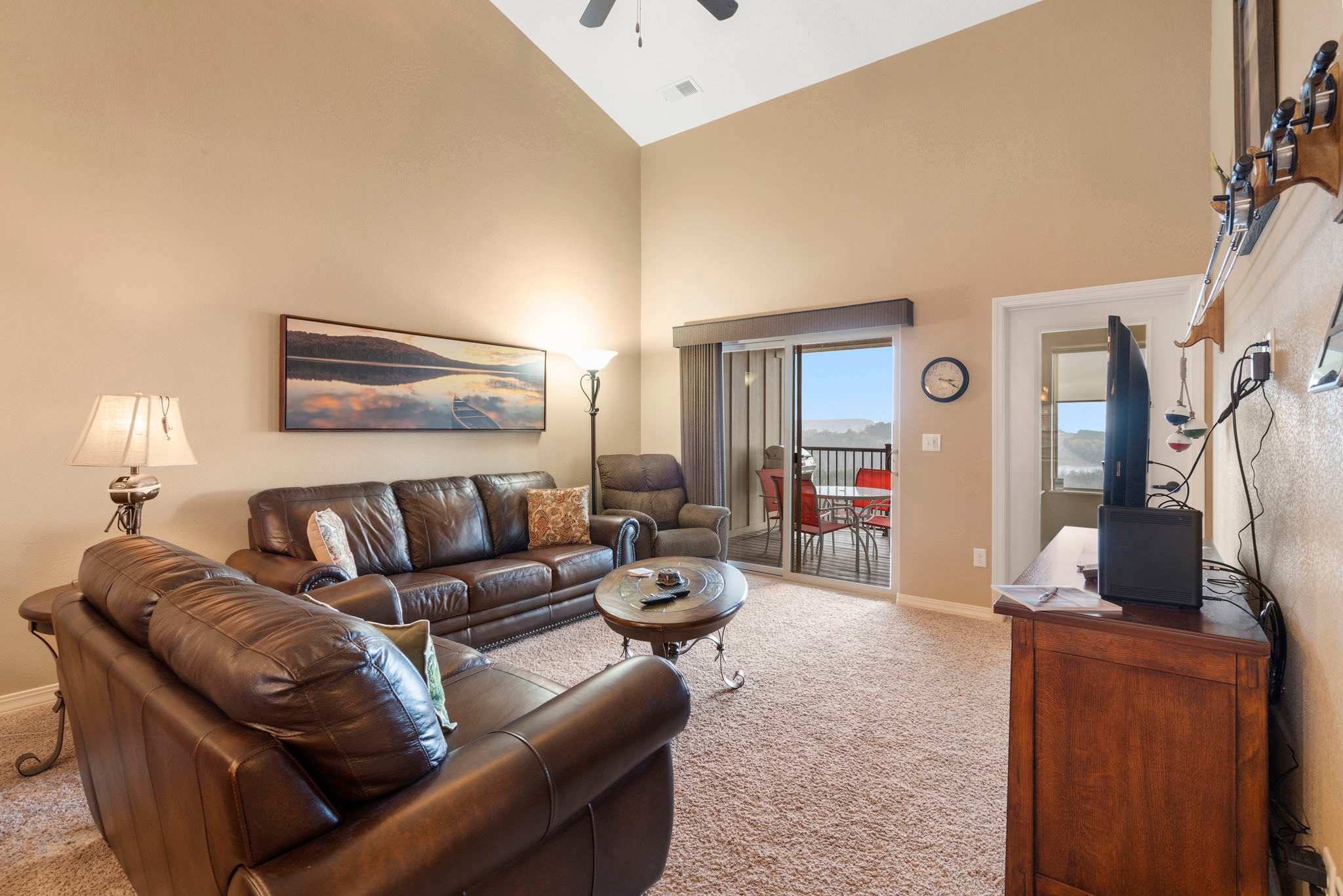 Cozy and spacious living area with TV