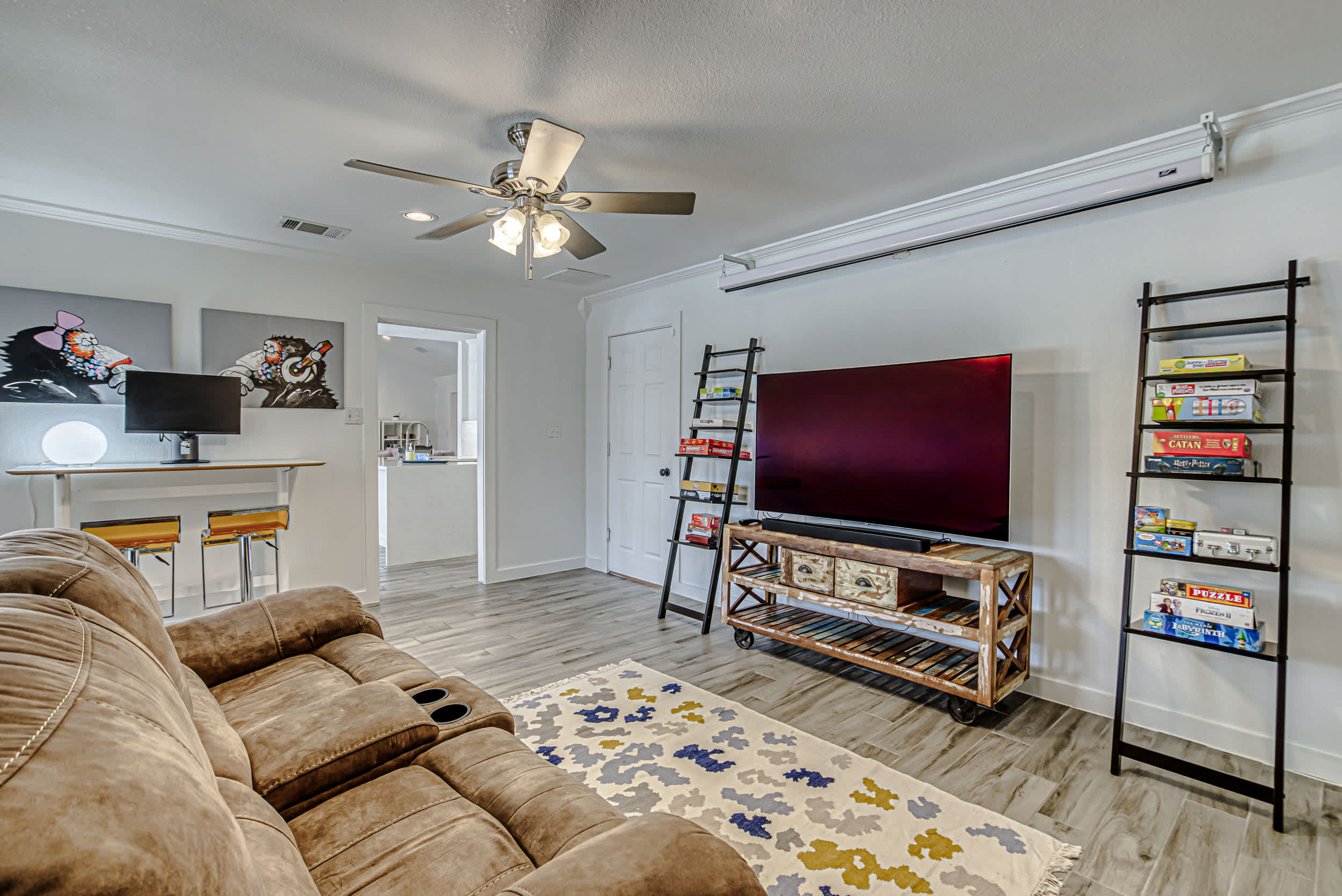 Kick back & relax in the den for the ultimate movie night!