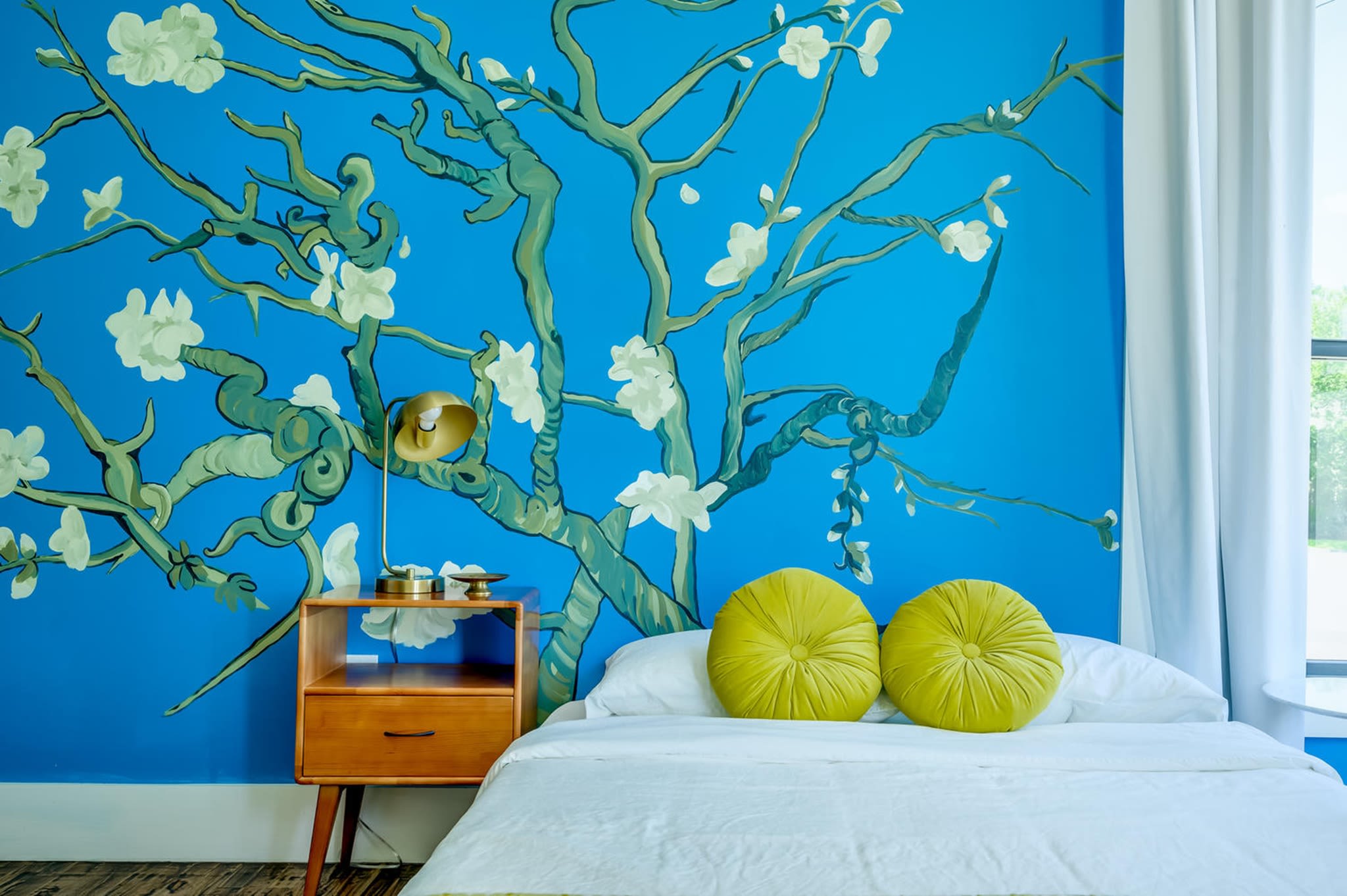 Suite 101 – The 1st Floor Van Gogh Suite boasts a Casper King Bed, Smart TV, and private En Suite with Claw-Foot Tub