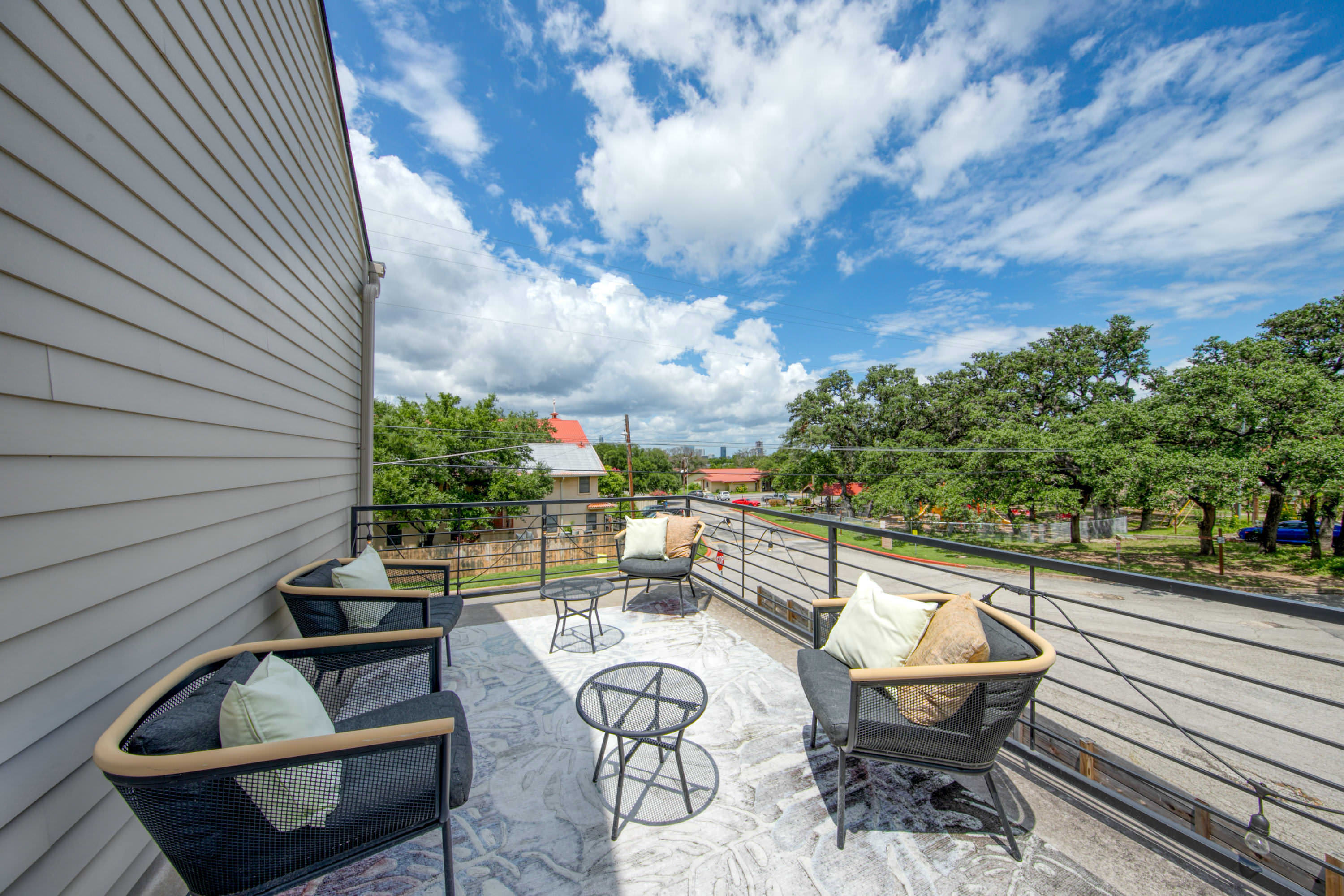 Upstairs deck with BBQ and patio seating
