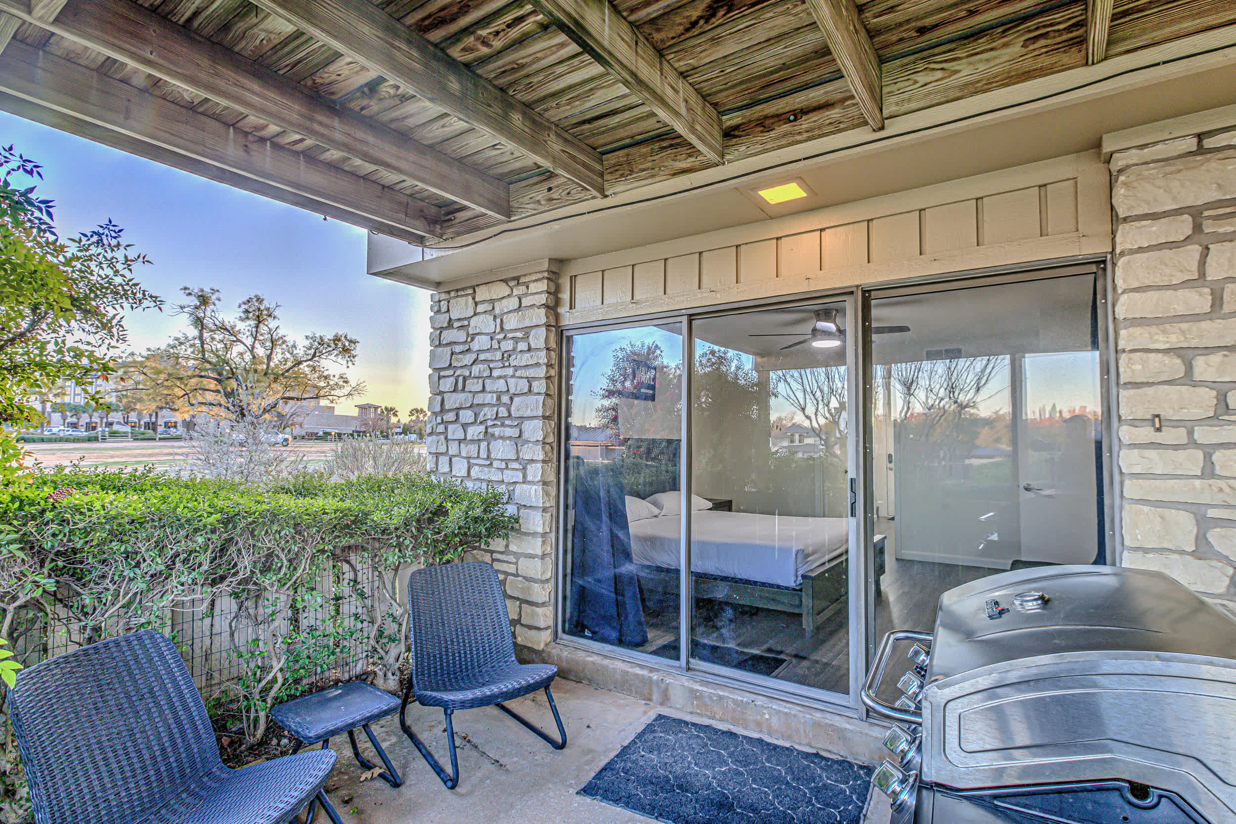 Patio with outdoor seating and grill