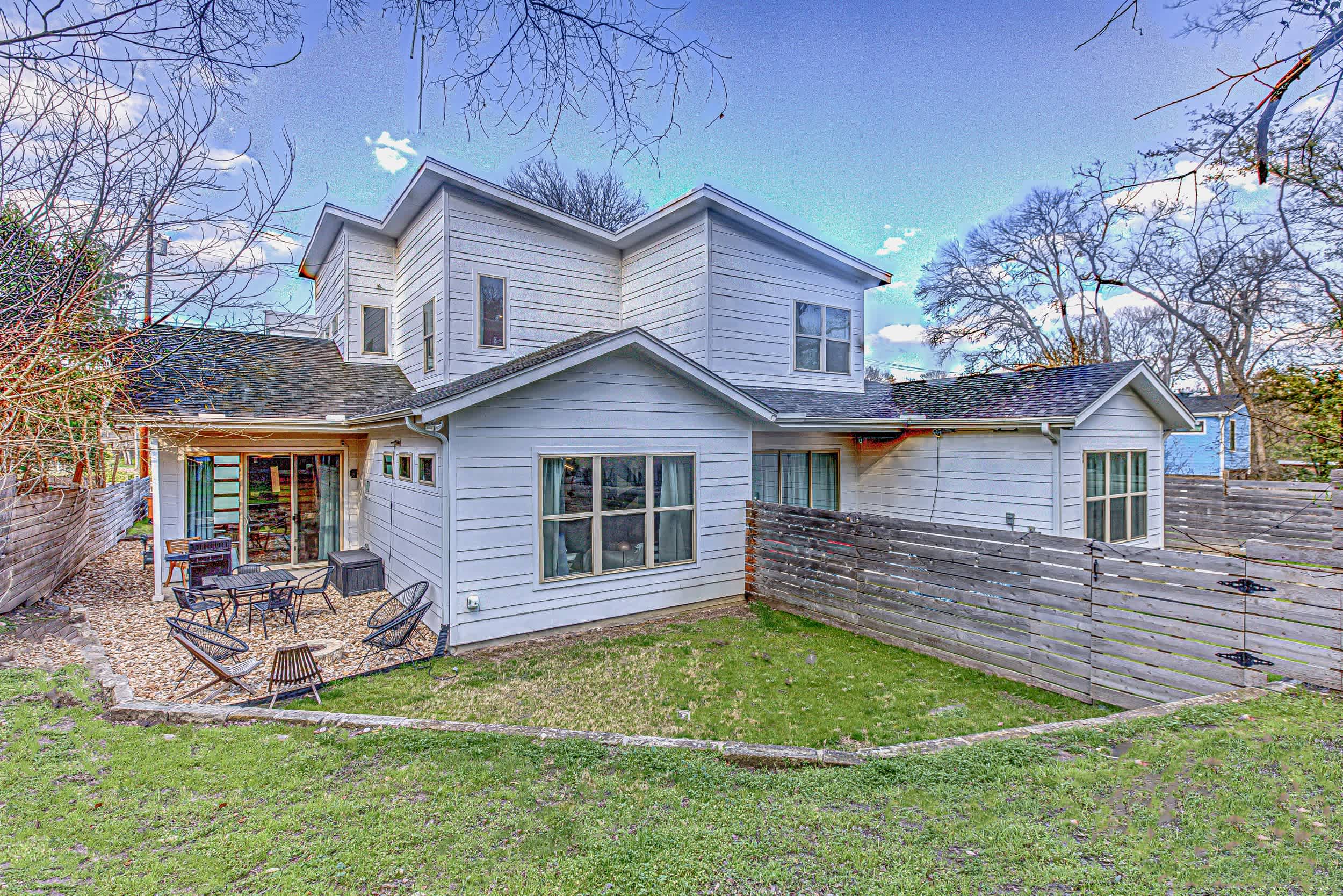 Back yard with out door seating, grill and firepit (Unit B)