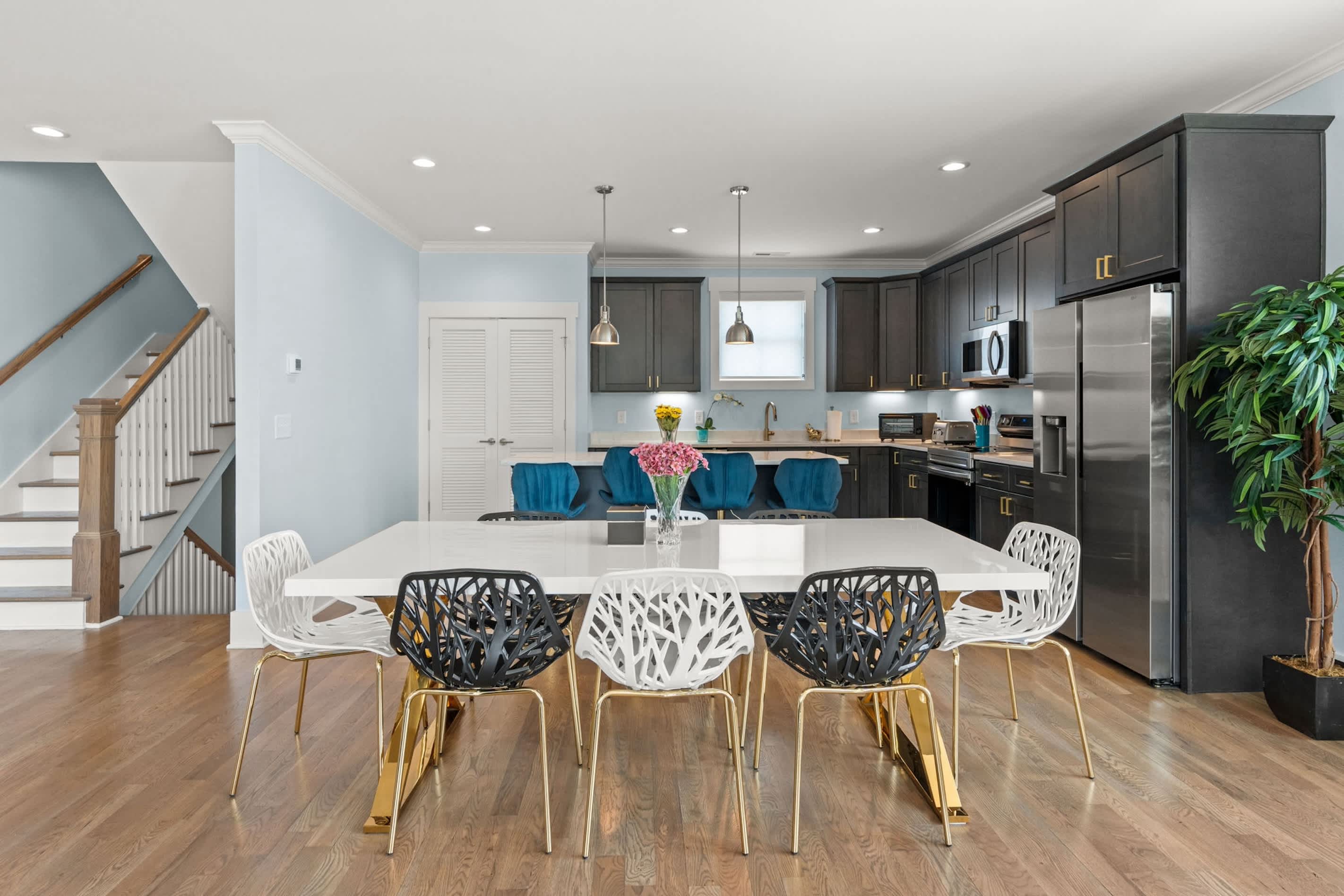 Gather for meals together at the elegant dining table, seating 8