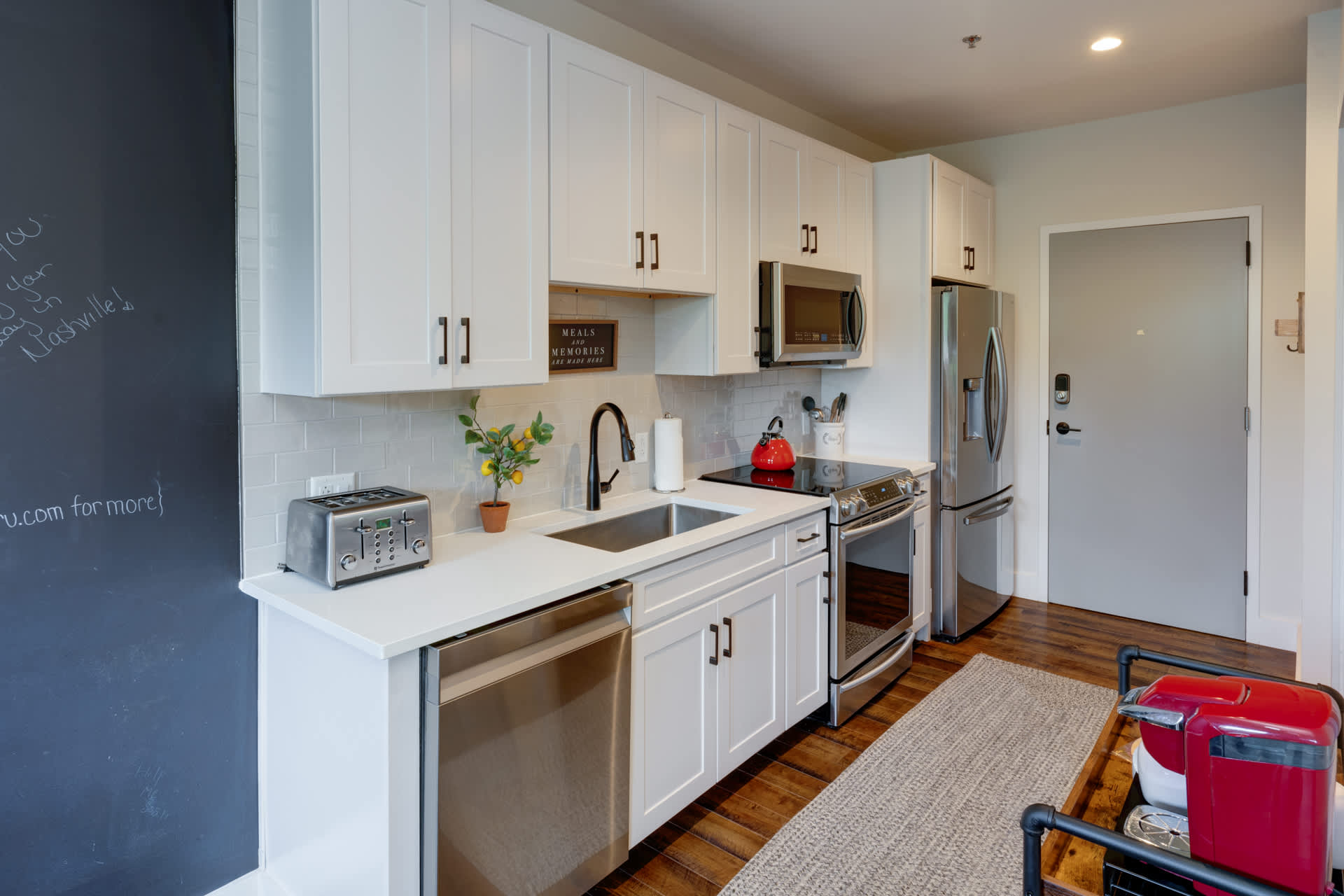 The updated kitchen offers all the comforts of home with chic finishes