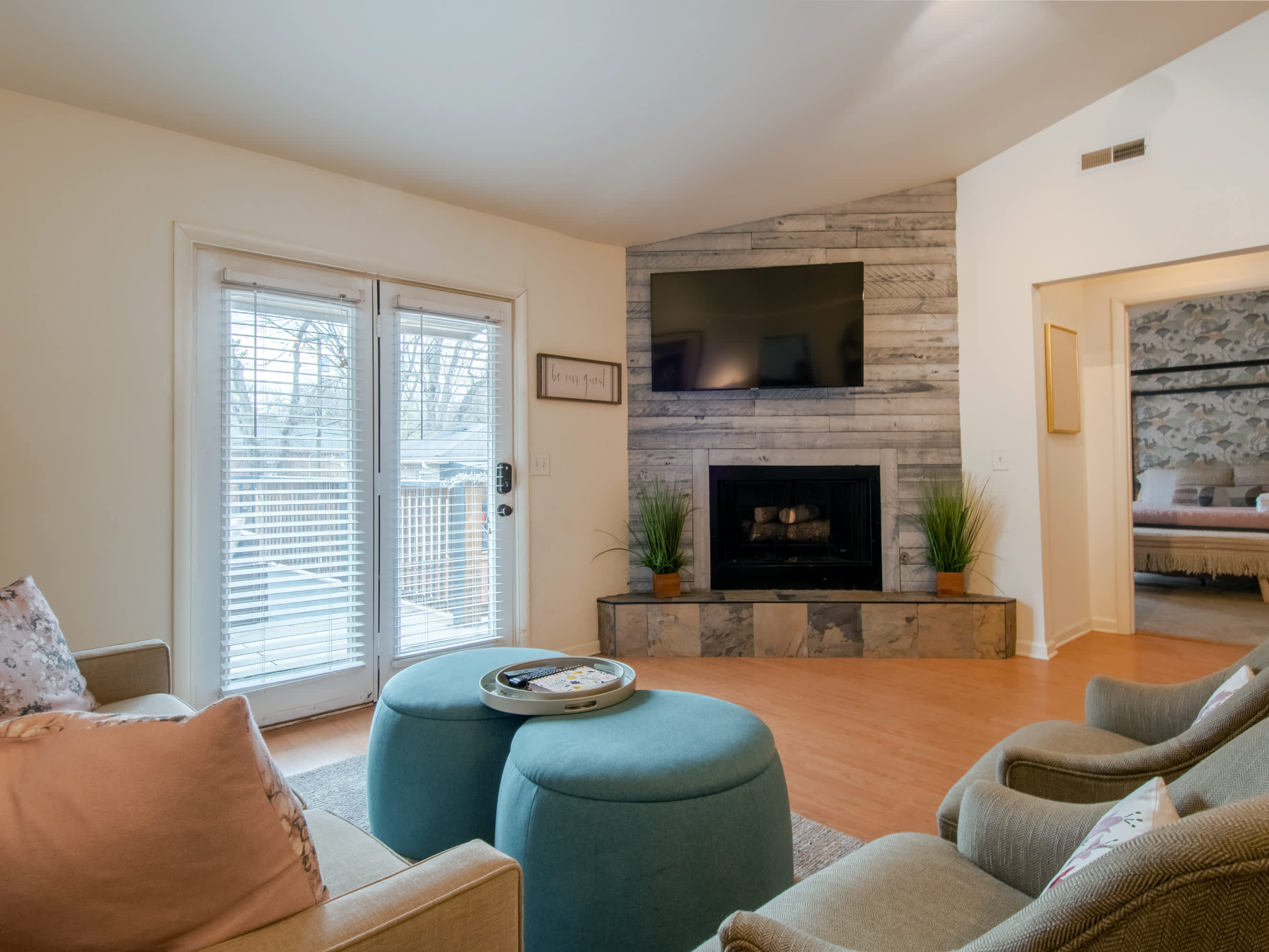 Living room with Smart TV and balcony