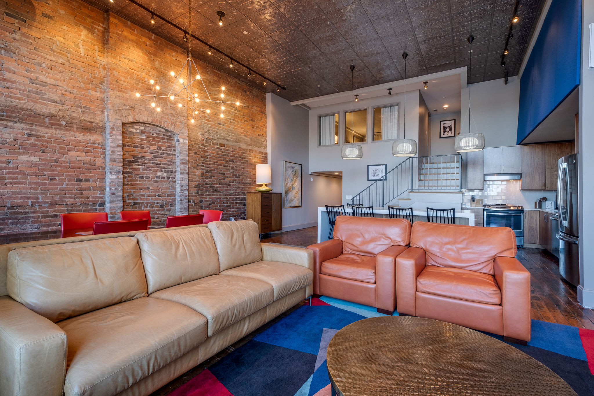 Enjoy the stylish industrial decor with an open-concept design and modern amenities