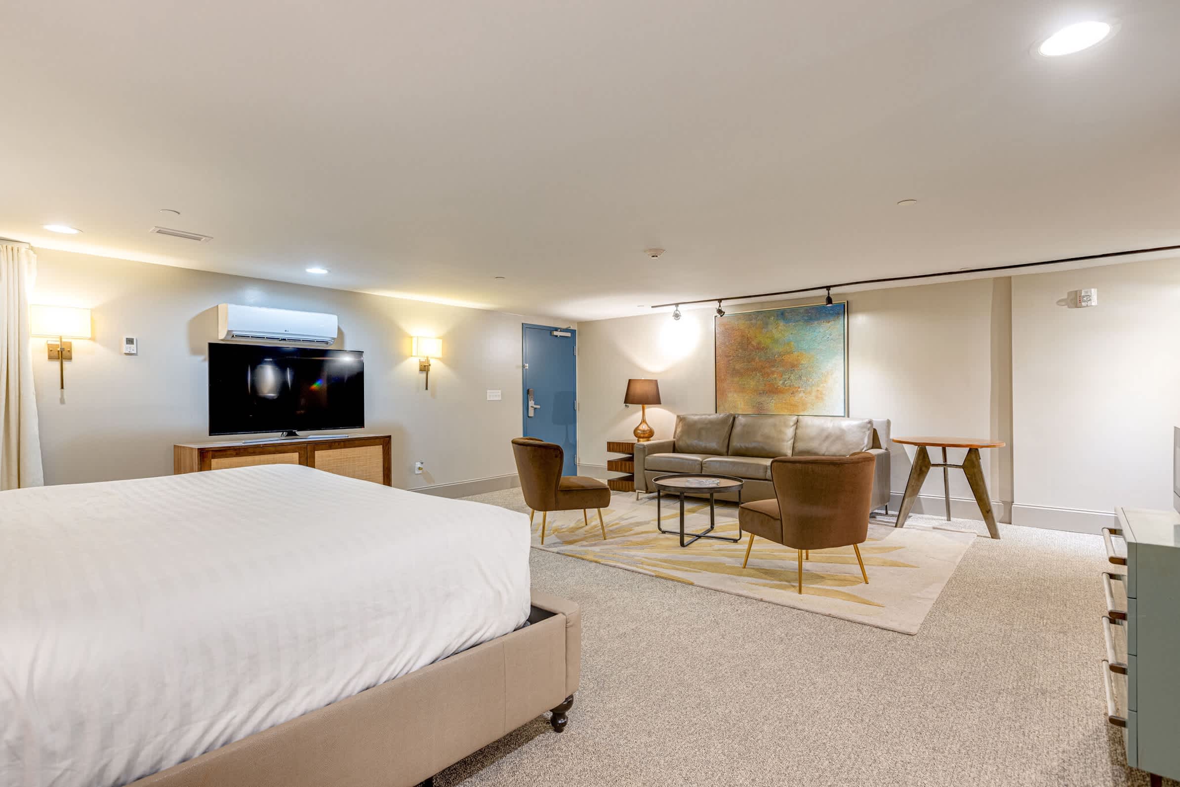 Studio with sofa sleeper, king bed, TV, and kitchenette 