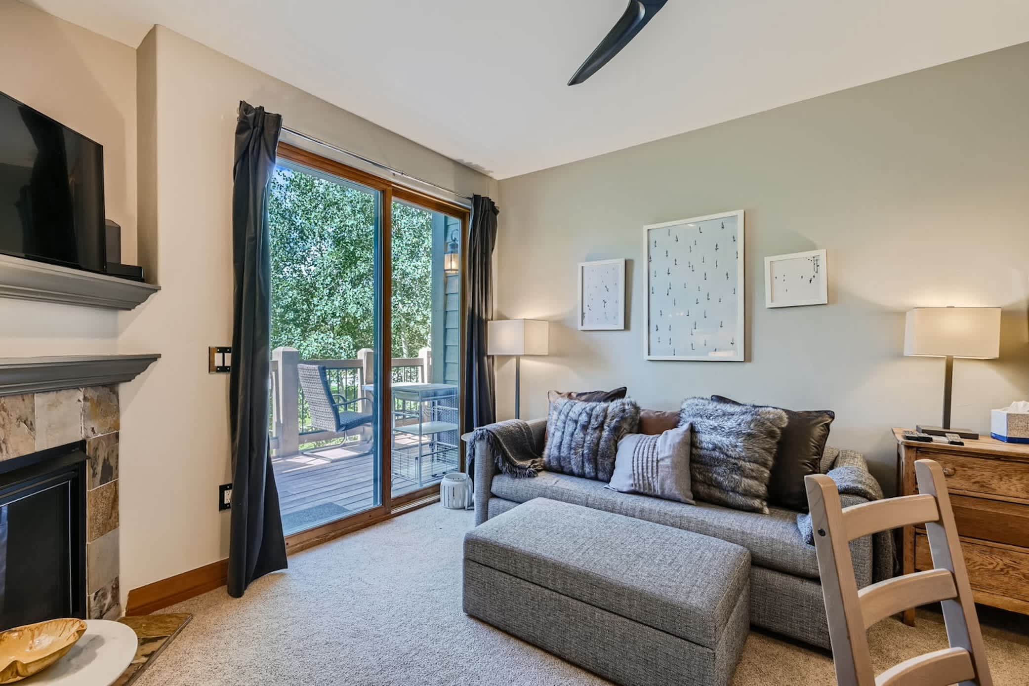 Curl up in the living room by the fireplace & enjoy a movie night at home