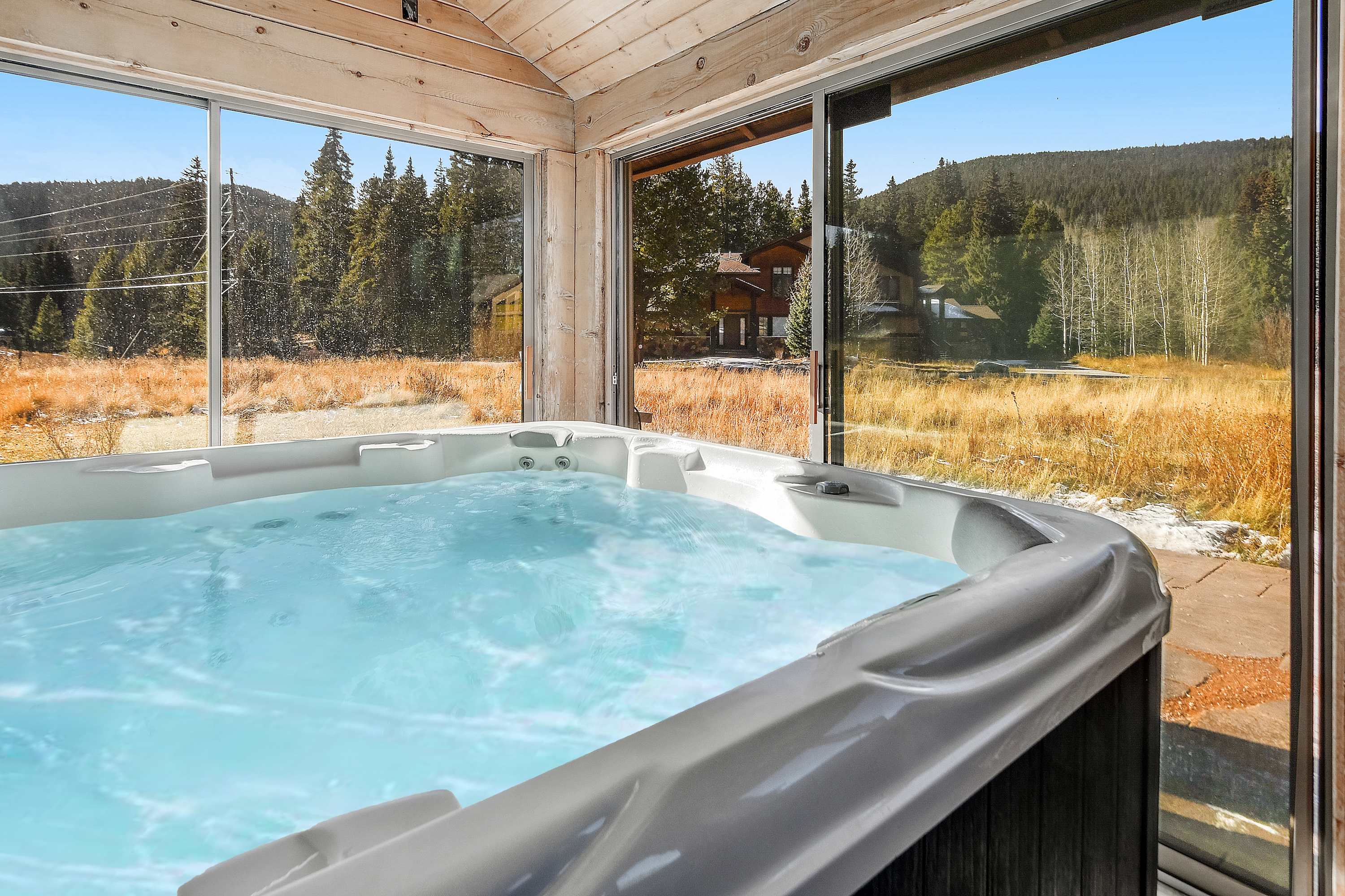 Bask in bubbling bliss with stunning views in the private hot tub