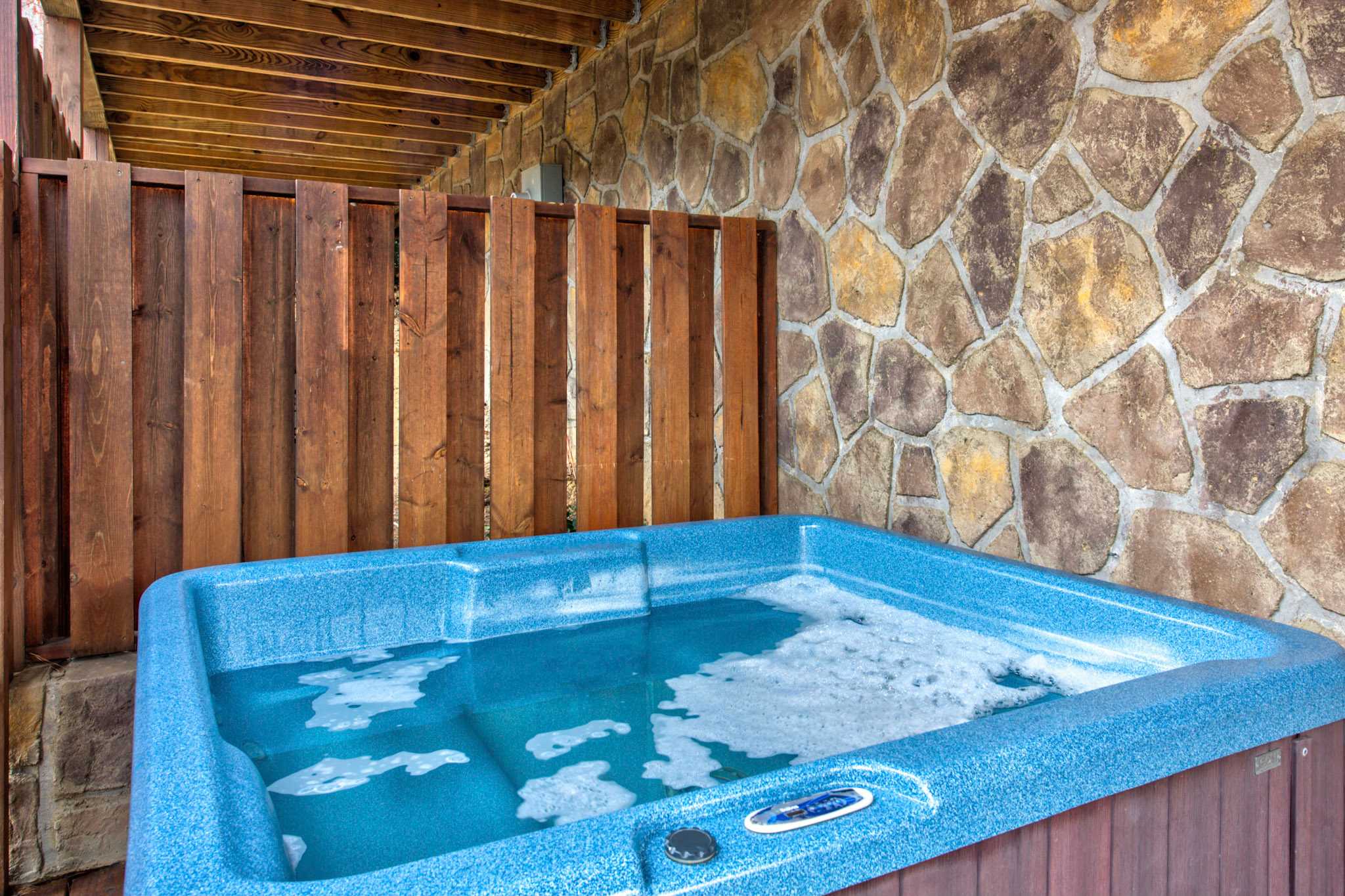 Relax and unwind in the private hot tub