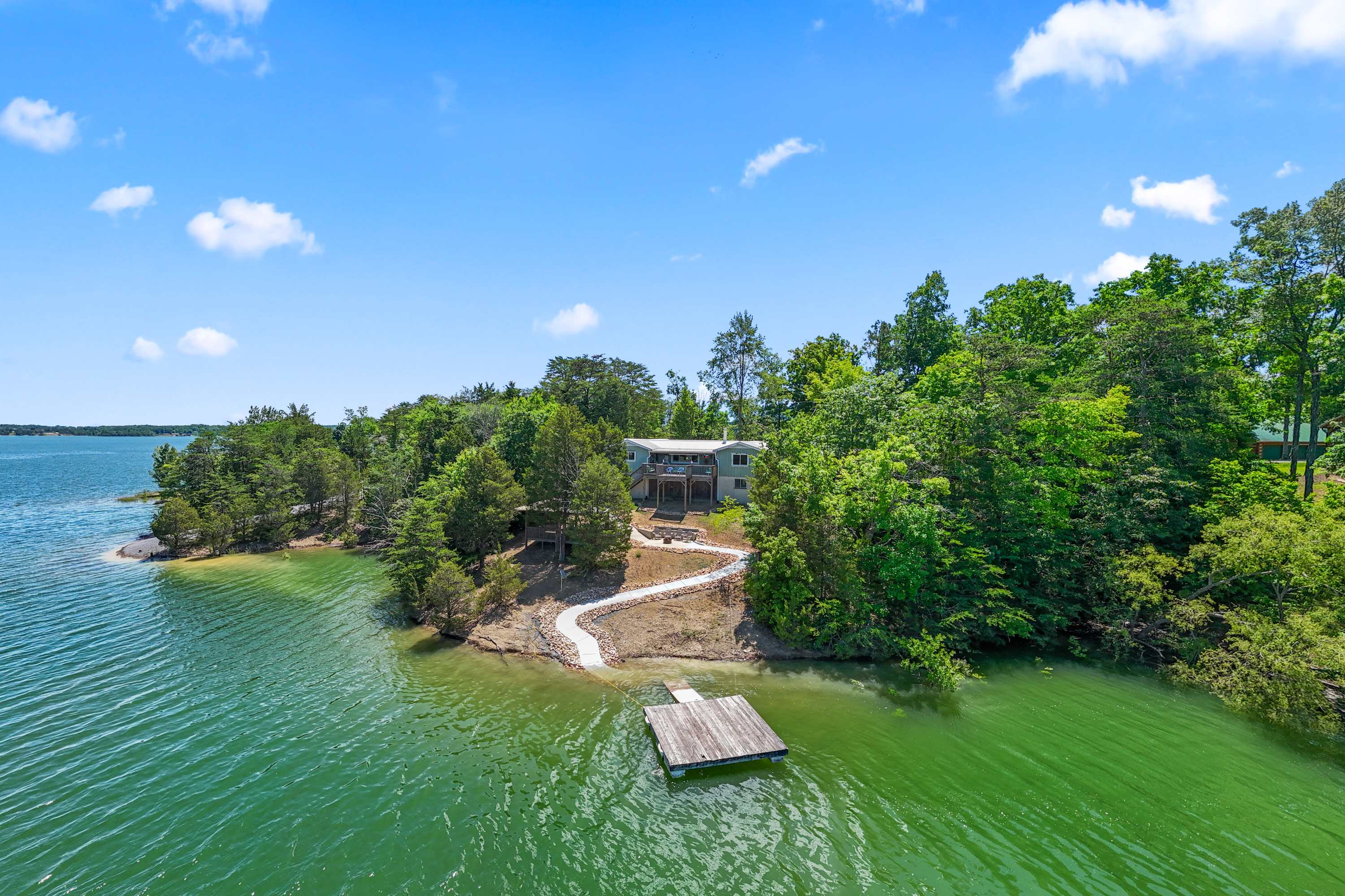 Rustic Lakefront Home with Beach!