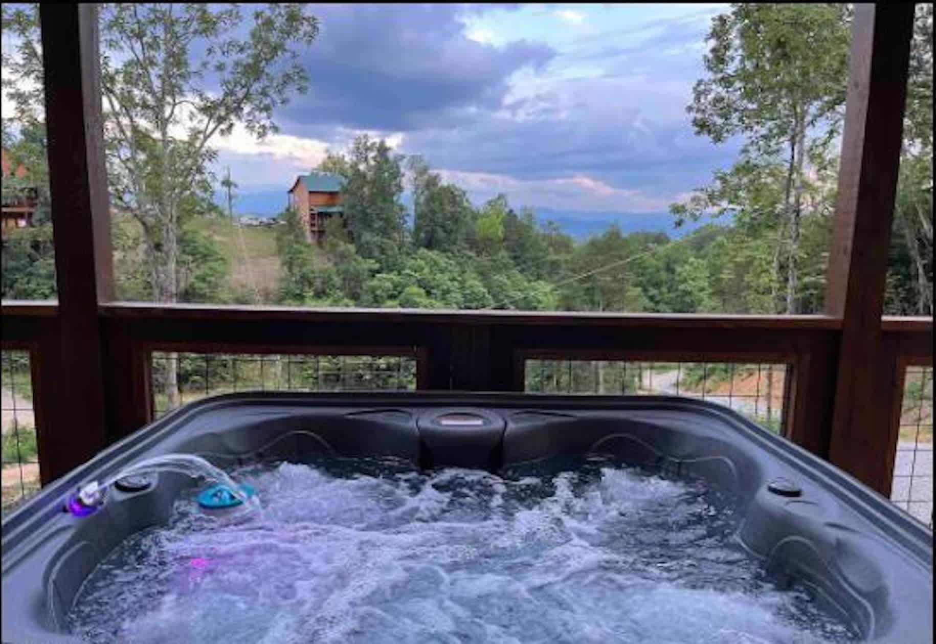 Bask in bubbling bliss with stunning views in the private hot tub