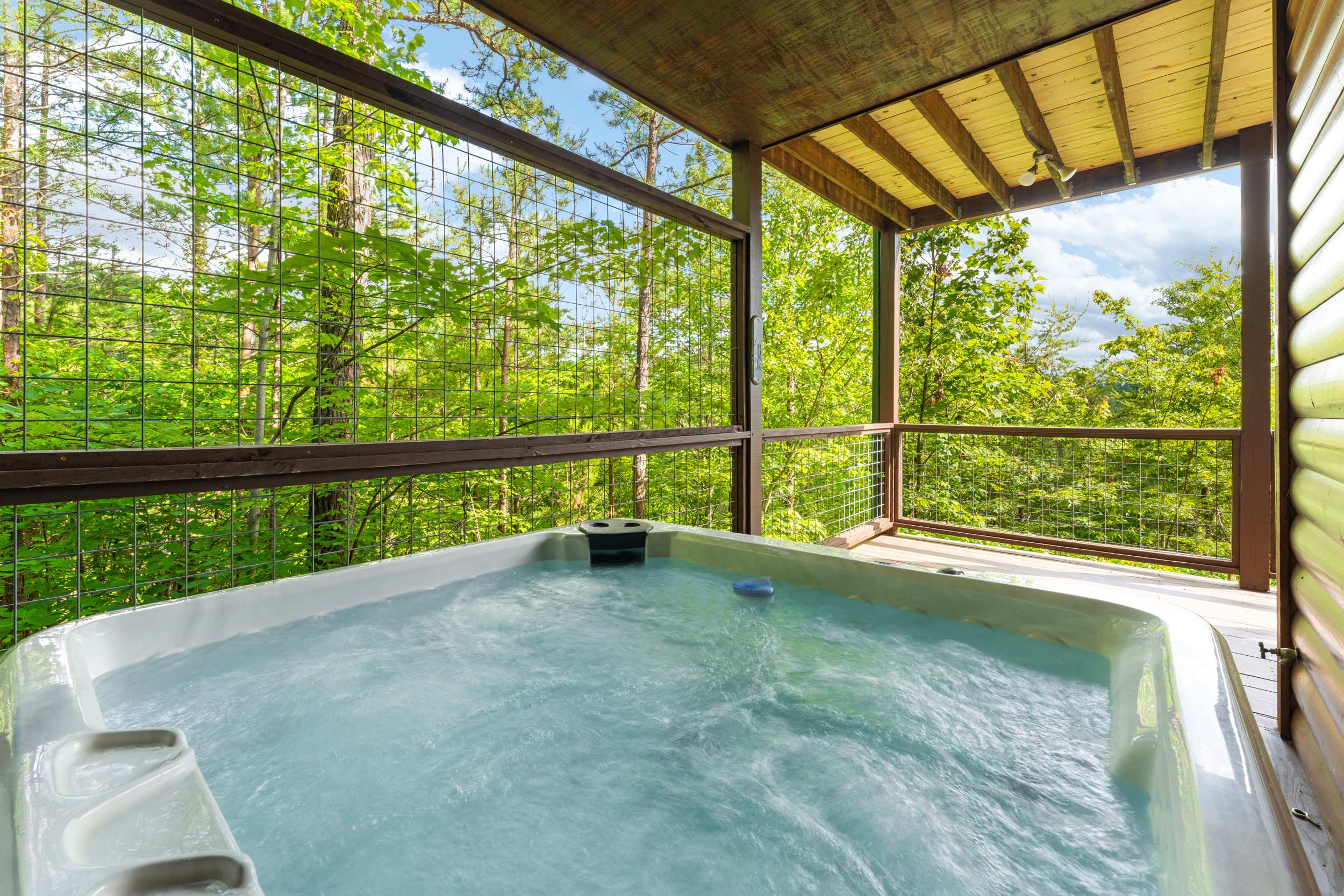 Soak your cares away in this private hot tub!